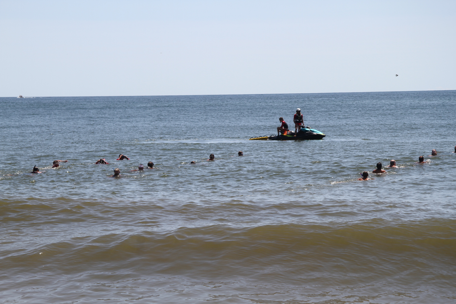 East Hampton Town Lifeguards and members of East Hampton Volunteer Ocean Rescue drilled with lifeguards from New York State Parks on the search for and retrieval of an unconscious, submerged swimmer. 
MICHAEL WRIGHT