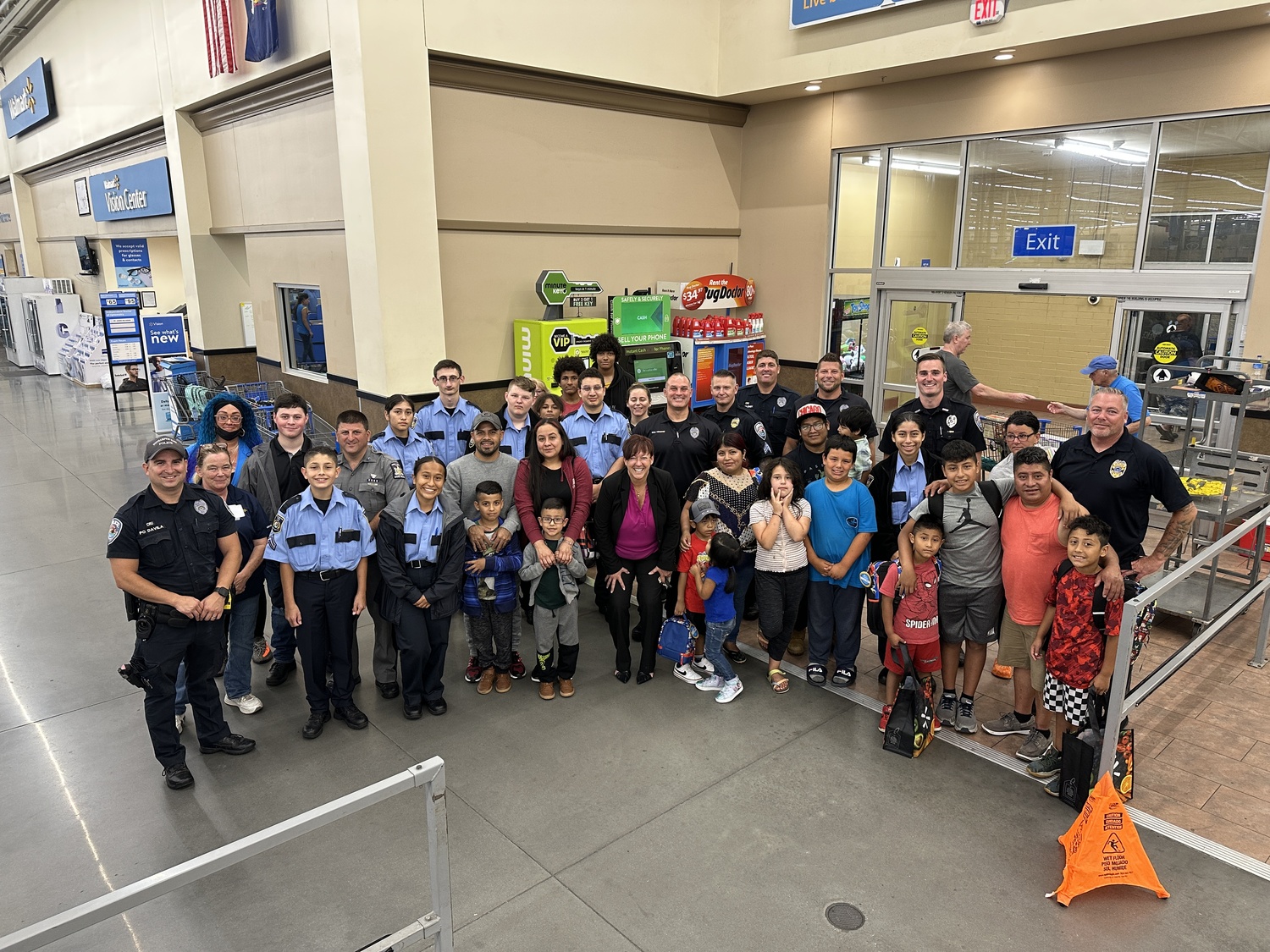 Officers shopping with kids at Walmart during the annual 