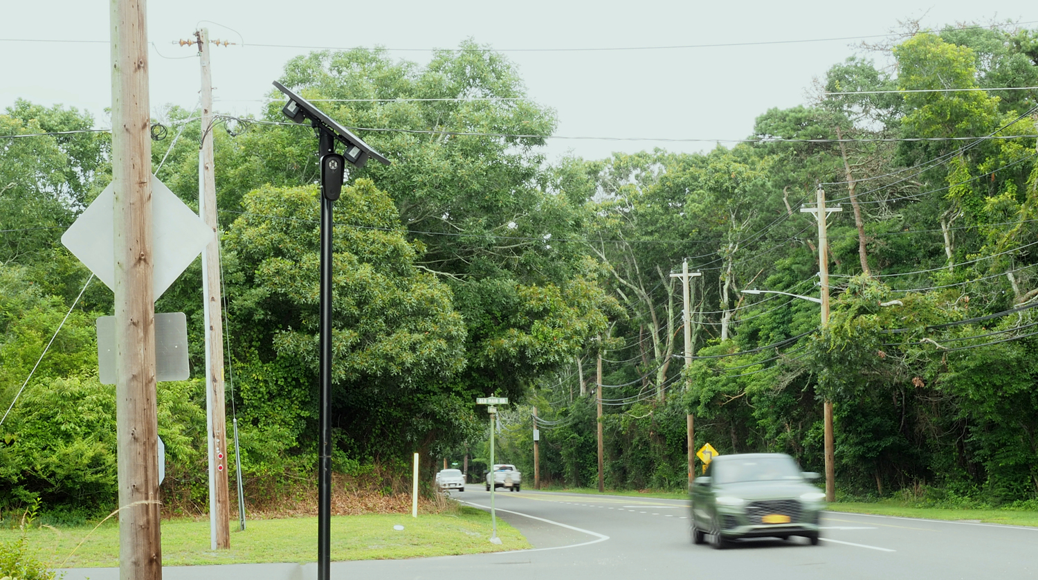 A car is about to pass through a license plate reader in Quogue Village. JOHN PAUL FERRANTINO