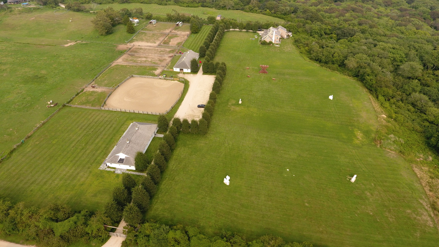 One of the two horse barns has been transformed into an art gallery at The Ranch, as the former Indian Field property is now called by its owner, Max Levai. East Hampton Town claims that using the property, which is an agricultural reserve, violates town code. 
MICHAEL WRIGHT