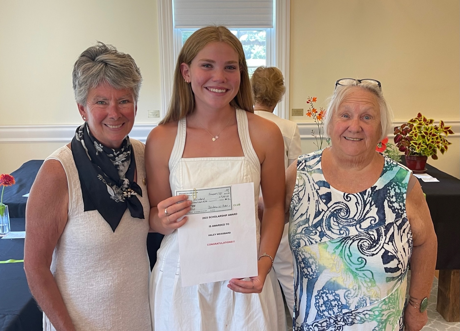 Westhampton Garden Club President Melissa Morgan Nelson, left, and Scholarship Chair Diane Stewart, right, congratulate scholarship award winner Haley Weissbard. COURTESY WESTHAMPTON BEACH GARDEN CLUB