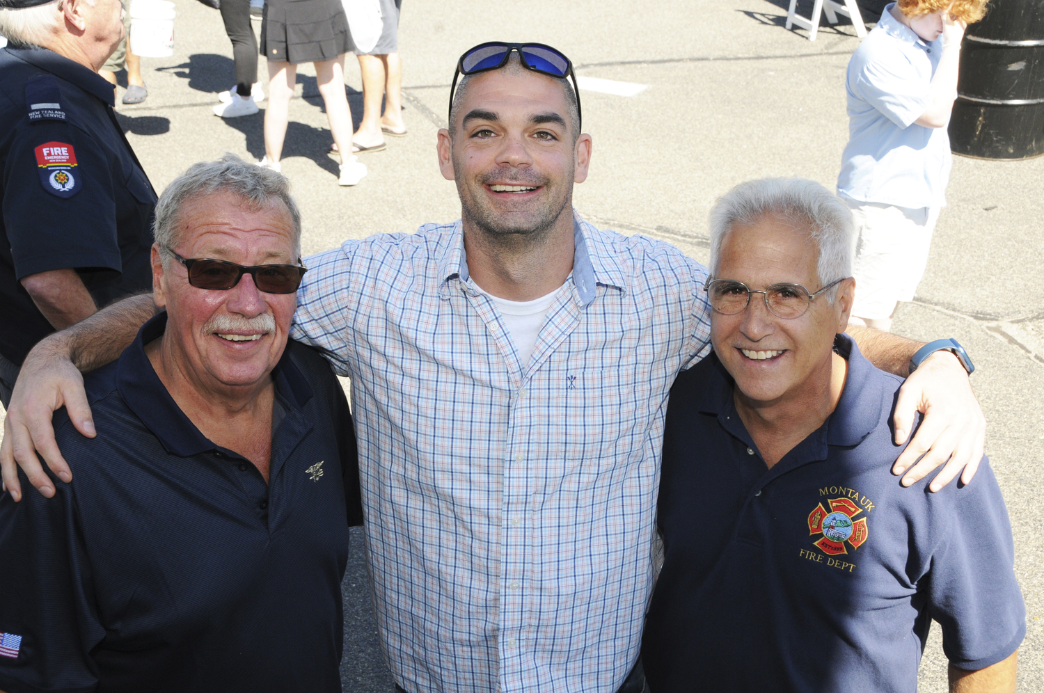Eddie Ecker, East Hampton Town Police Sergeant Kenneth Alversa, and Montauk Fire Department former Chief Tom Grenci at the 40th annual  Montauk Fire Department Big Bucks Bonanza on Sunday at the firehouse. Music was provided by the local Nancy Atlas Project and special guest musician Joe Delia. Proceeds from the Bonanza go to a Scholarship Fund for Montauk youths. Each scholarship is in memory of a Montauk fireman who worked at Montauk School:  Custodian Don Truesdale; Athletic Director Hank Zebrowski; Crossing Guard Skip Cannon; and Superintendent  Bob Fisher. To date, the Big Bucks Bonanza prize drawing has given away Scholarship prize money totaling almost $5,000,000.   RICHARD LEWIN