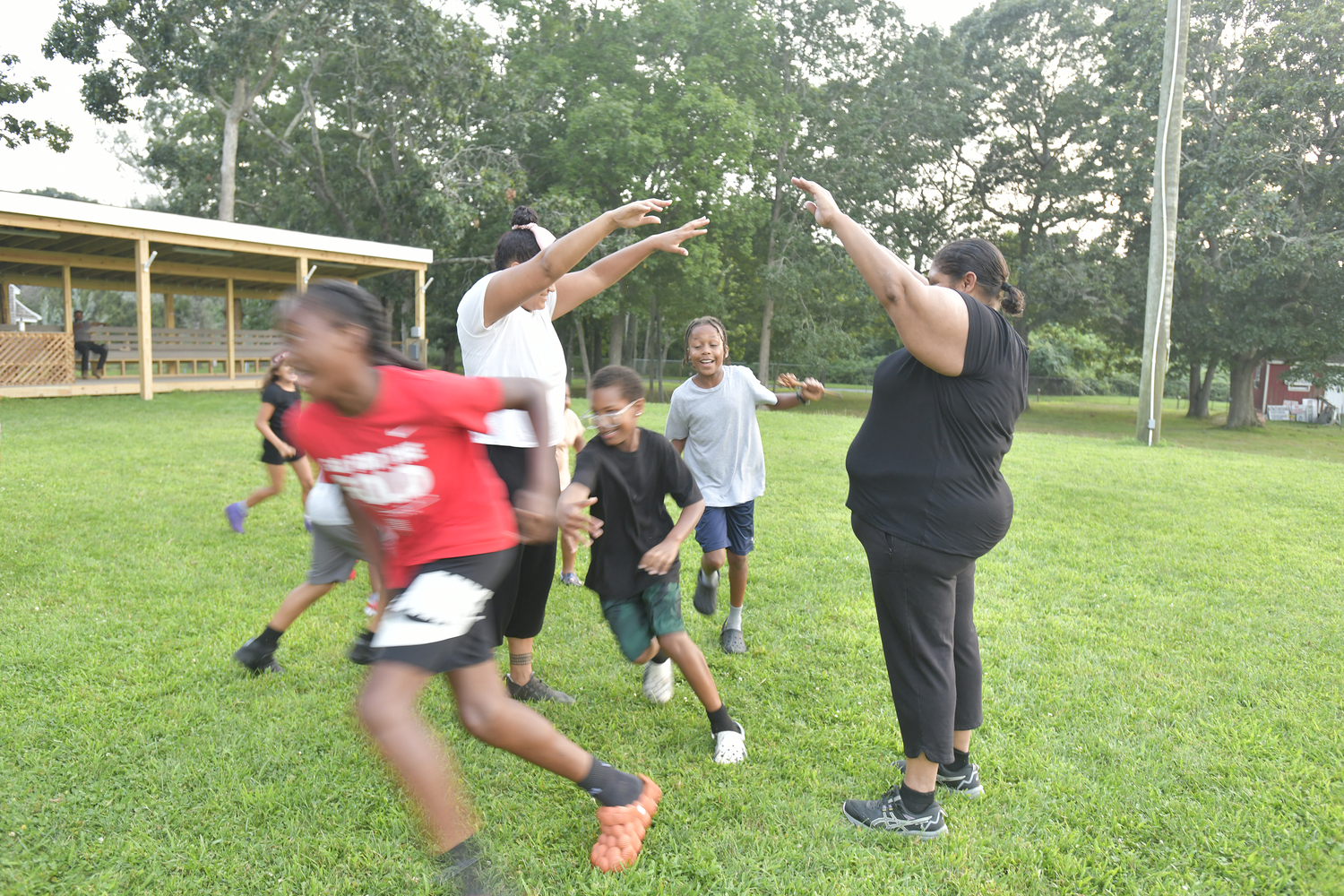 The Shinnecock Boys and Girls Club practice at the Powwow grounds on Monday evening.  DANA SHAW