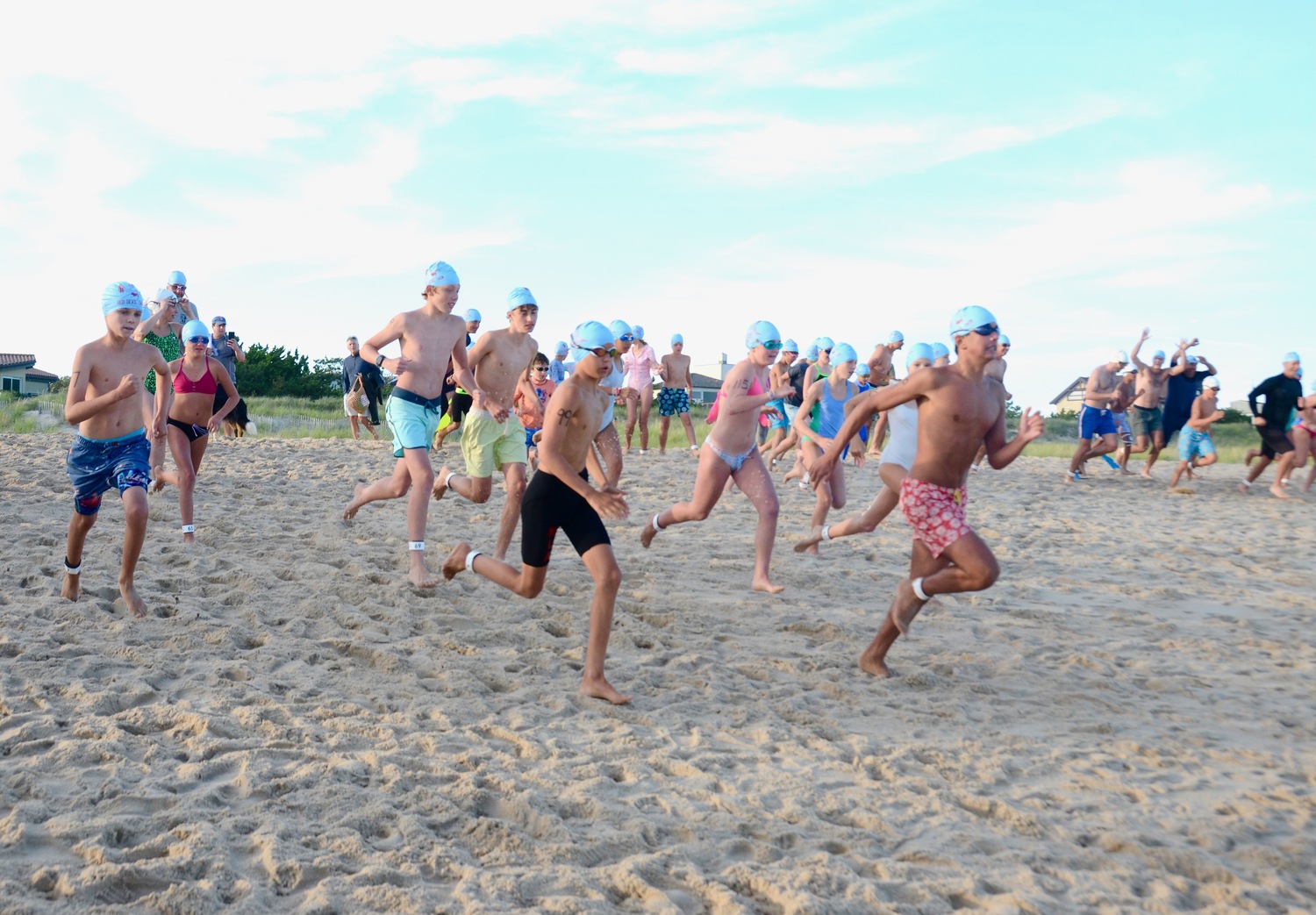 East Hampton Volunteer Ocean Rescue hosted its Red Devil Swim on Saturday at Atlantic Avenue Beach in Amagansett.   KYRIL BROMLEY