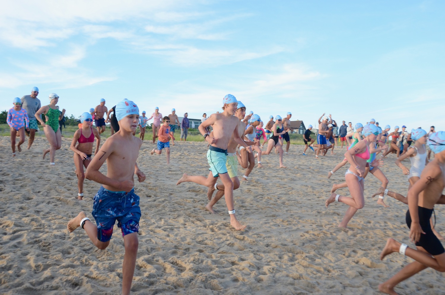 East Hampton Volunteer Ocean Rescue hosted its Red Devil Swim on Saturday at Atlantic Avenue Beach in Amagansett.   KYRIL BROMLEY