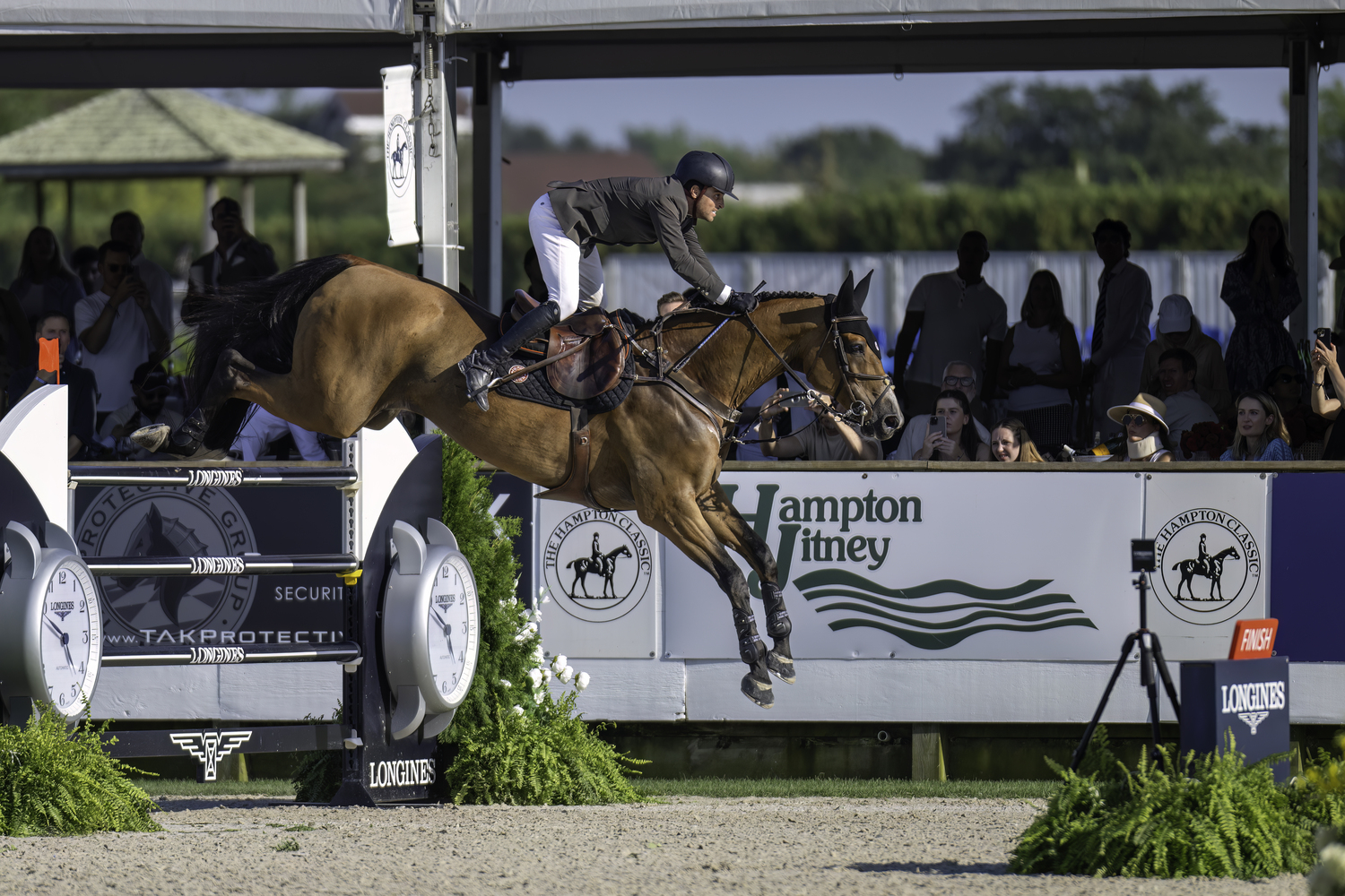 Daniel Bluman and his horse, Ladriano Z, prevailed in a two-rider jump-off to win the $425,000 Longines Hampton Classic Grand Prix on Sunday. MARIANNE BARNETT