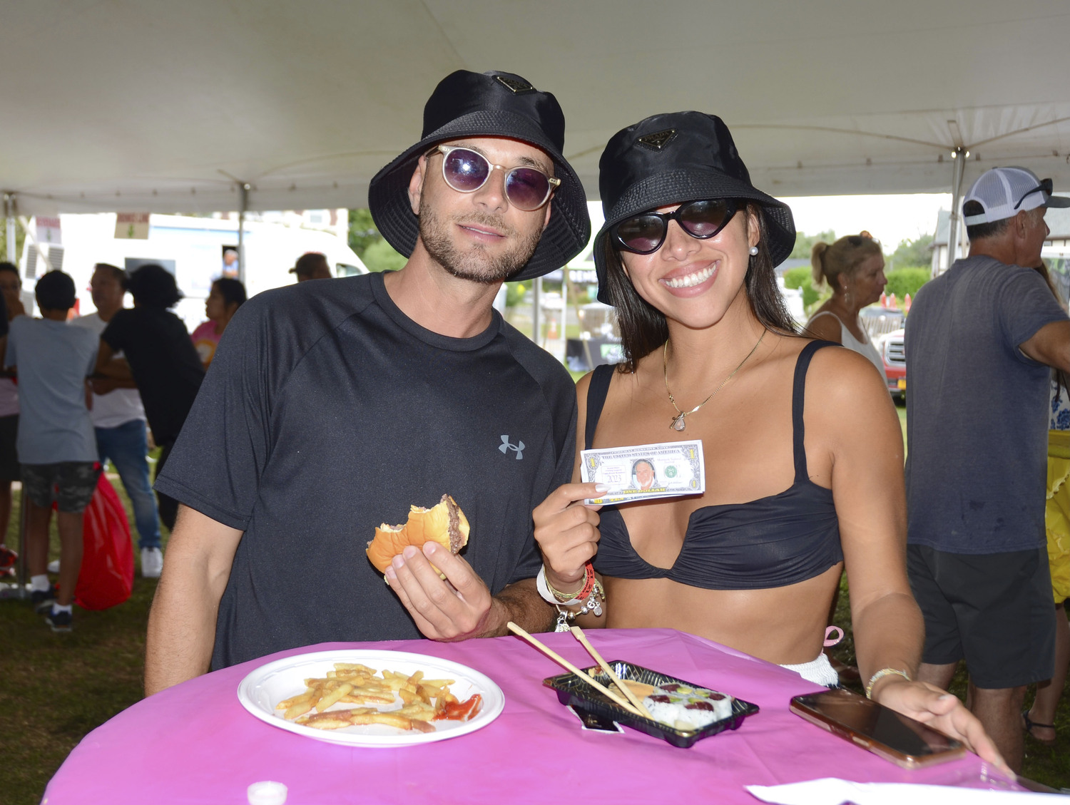 Anthony Yaffa and Cynthia Lozano at the Montauk Seafood Festival on Sunday to Benefit the Montauk Friends of Erin and the Kiwanis Club of East Hampton .  KYRIL BROMLEY