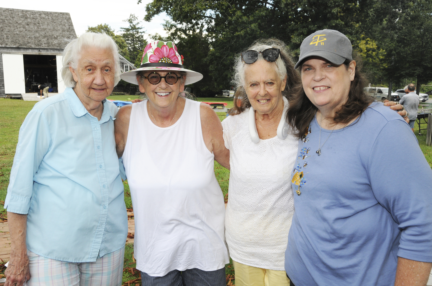 Alice Wood, Terri Gaines, Prudence Carabine and Dana Lester at the Farm to Table Dinner at the East Hampton Historical Farm Museum on Sunday afternoon.  RICHARD LEWIN