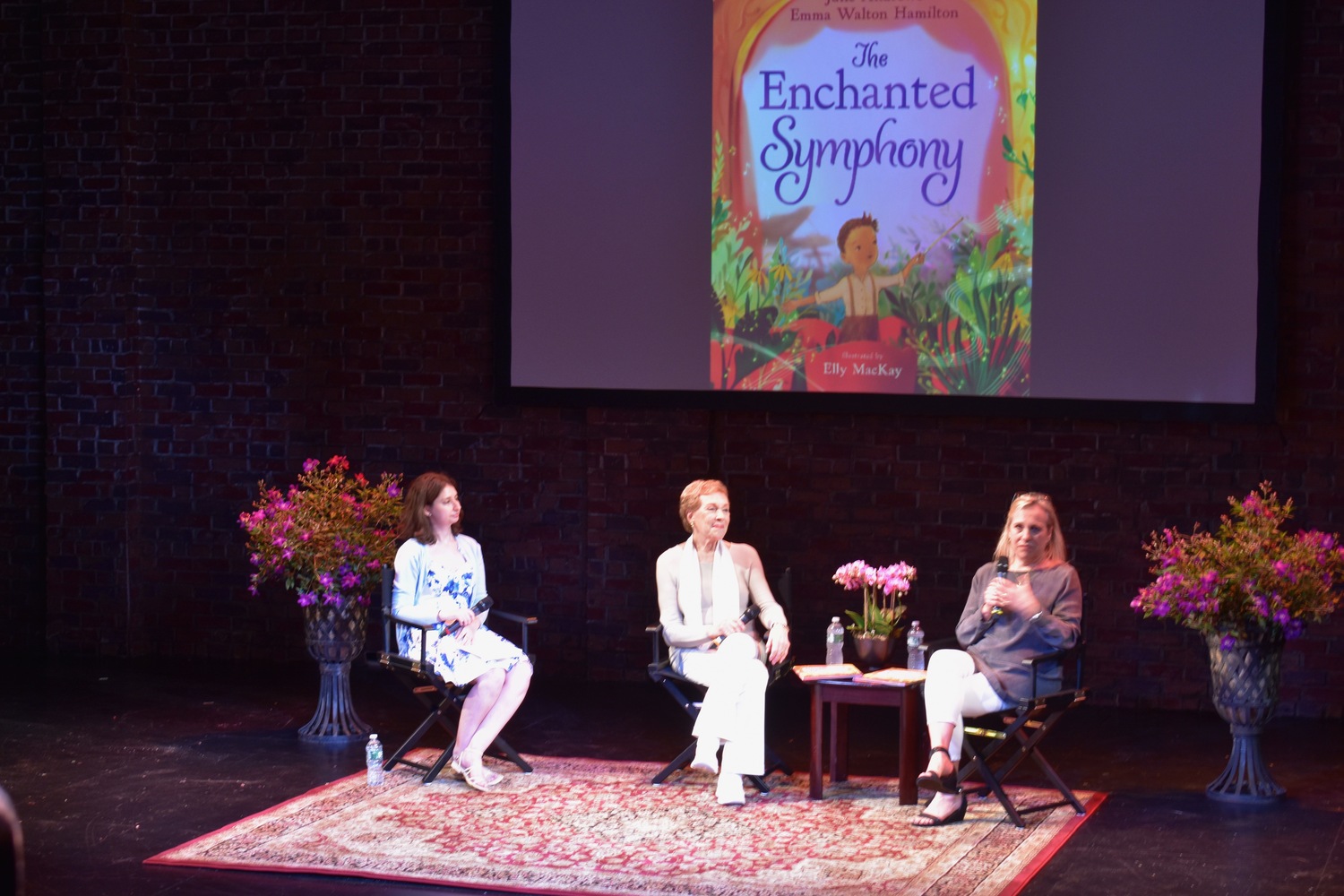Book editor Emma Kantor speaks with authors Julie Andrews and Emma Walton Hamilton at Bay Street Theater during the launch of their new children's book 