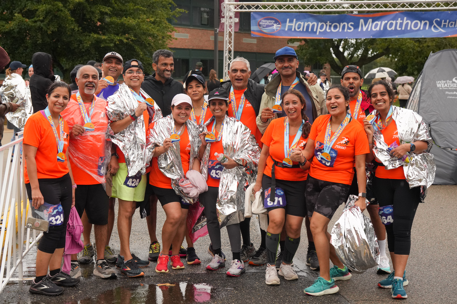 Despite the weather, those who came out for the Hamptons Marathon on Saturday in Southampton had a good time.  RON ESPOSITO