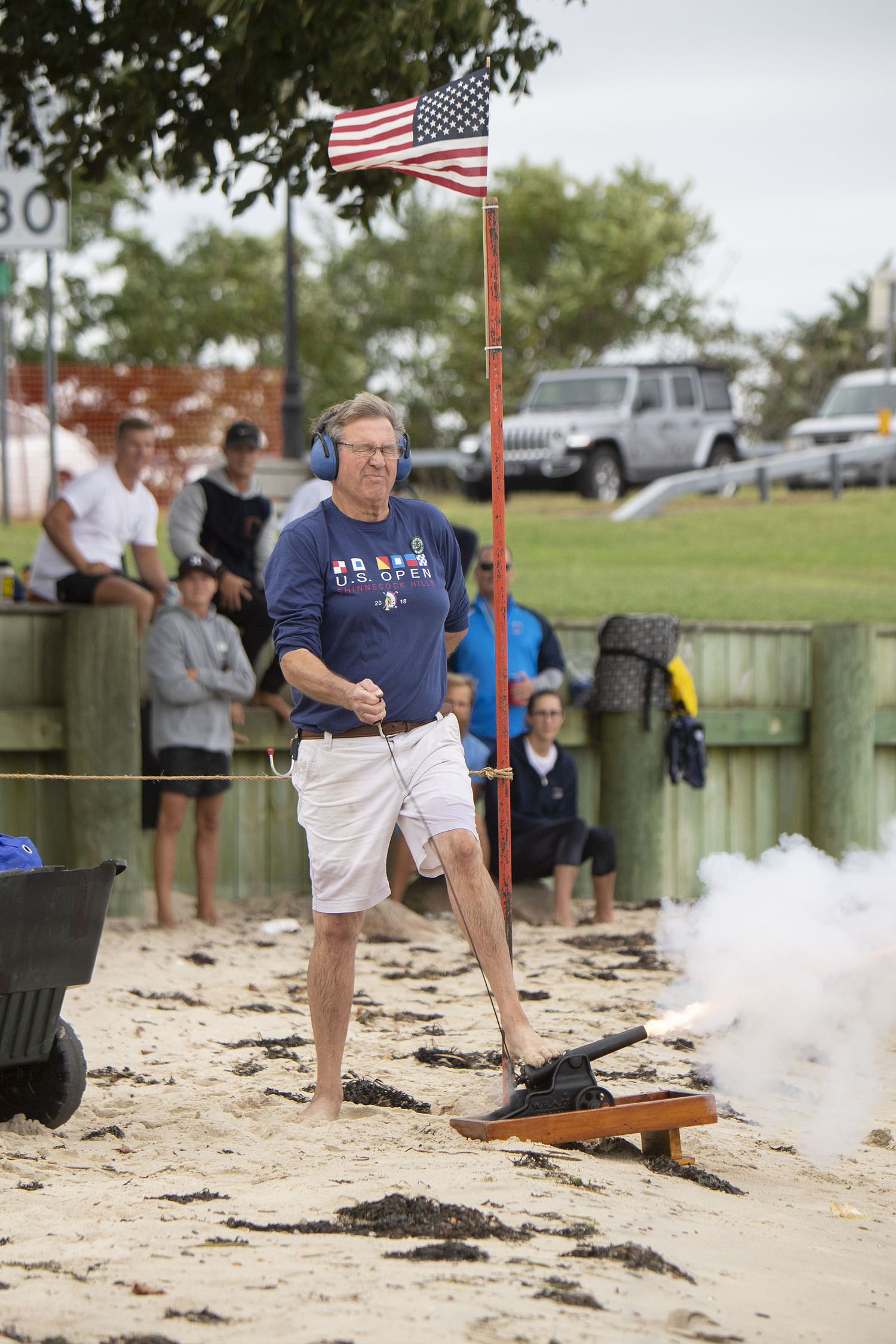 Dave Thommen fires off the cannon to start off a whaleboat race during the 2018 Harborfest celebration. MICHAEL HELLER