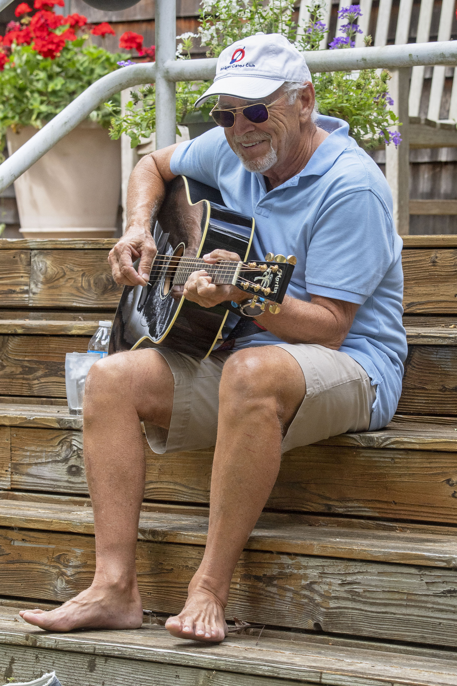 Jimmy Buffett performs at he grand opening of the newly-renovated playground behind North Village Hall on July 5, 2019.    MICHAEL HELLER