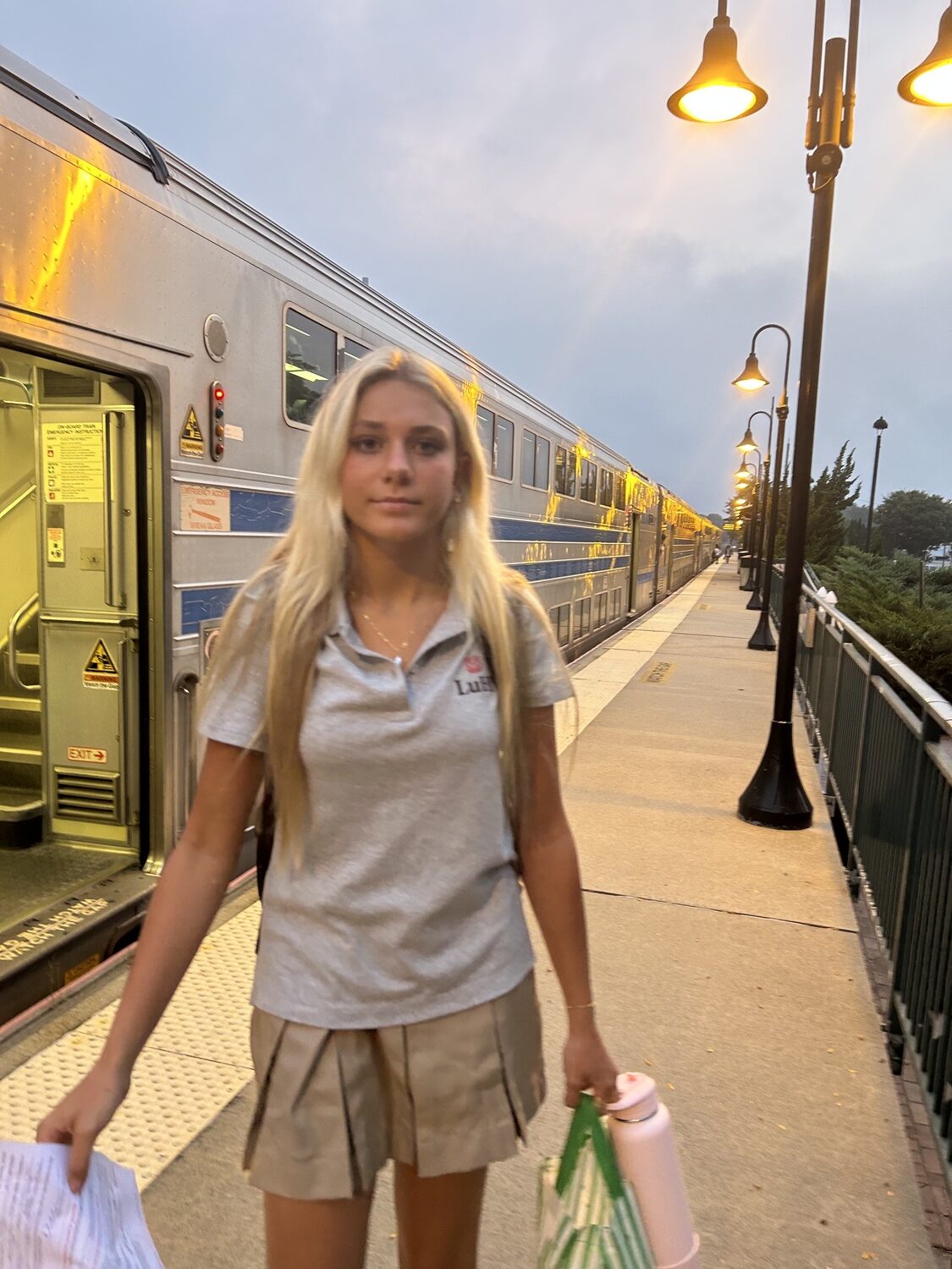 Coco Lohmiller ready to board the early LIRR train to get to Long Island Lutheran for school. Lomiller will be a member of the LuHi girls basketball team this year, one of the top ranked teams in the country.