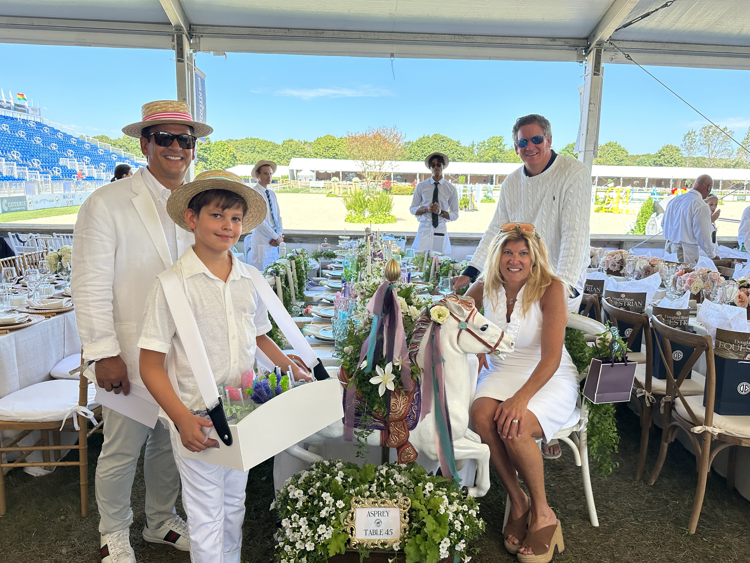 Daniel Morales, Lawson Cady, Michele Heary and John Regan at the Asprey Table at the Hampton Classic.    GREG D'ELIA