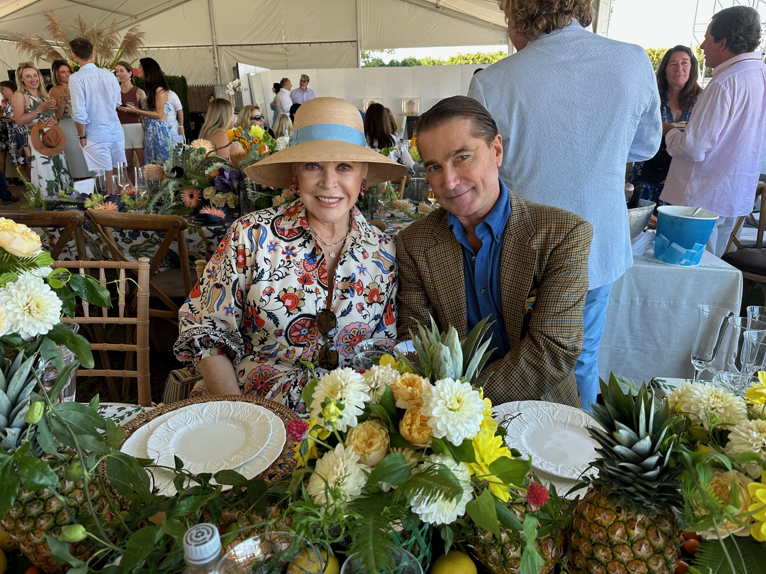 Audrey Gruss and Scott Snyder at Stony Brook Southampton Hospital Table at the Hampton Classic.     GREG D'ELIA