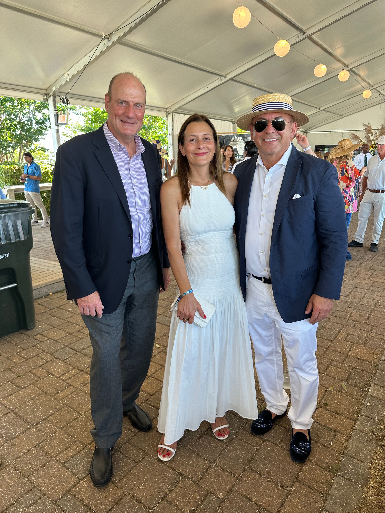 John Wambold, Jennifer Adams and Ben Segal at the Hampton Classic.            GREG D'ELIA