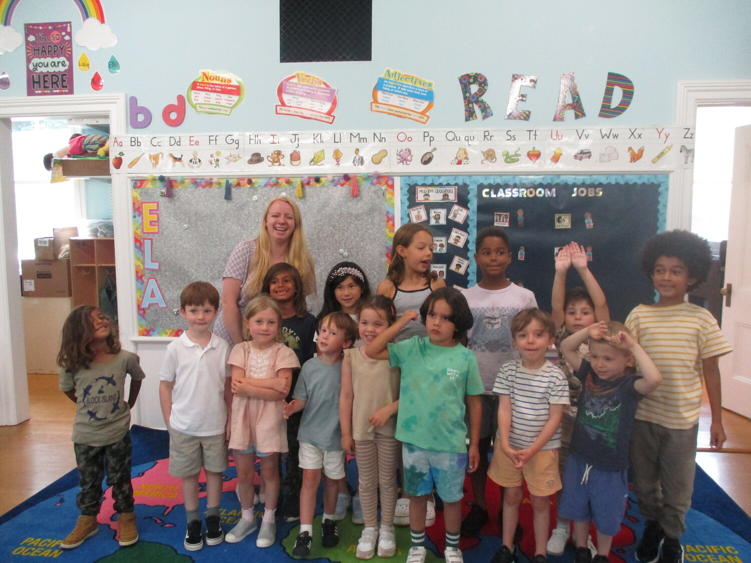 Hampton Library Children's Librarian Shannon Hughes with students from Sagaponack School. COURTESY SAGAPONACK SCHOOL