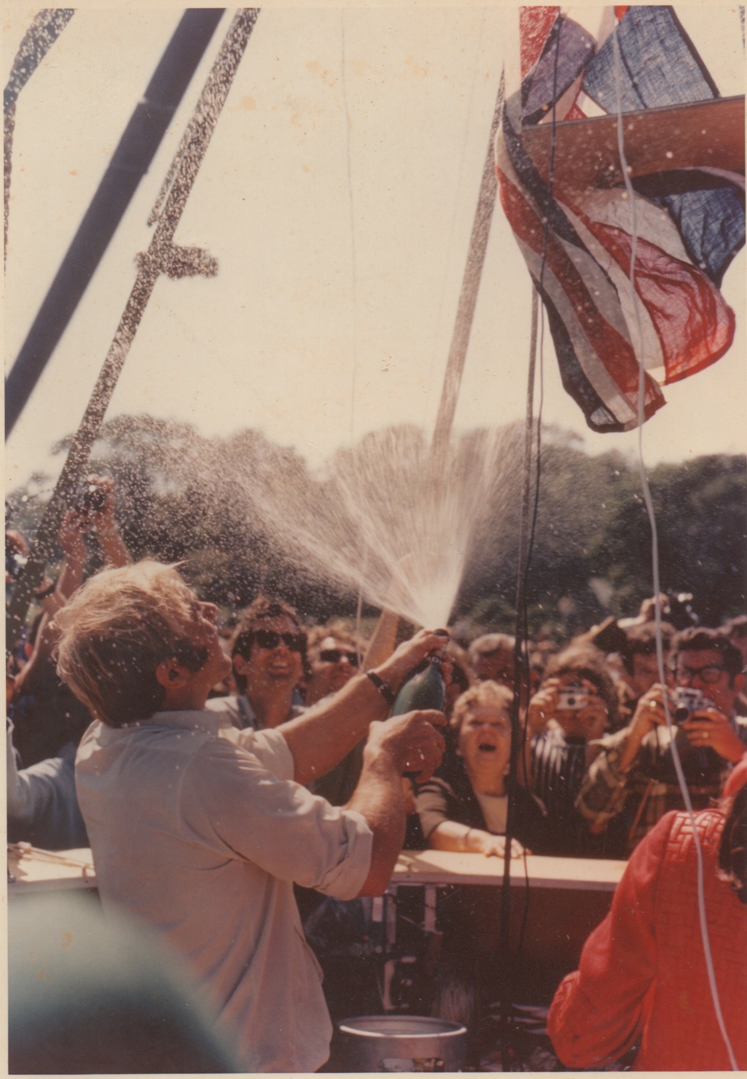 Malcolm Brighton spraying champagne as The Free Life prepares to depart from Springs on September 20, 1970. JONATHAN RICHARDS