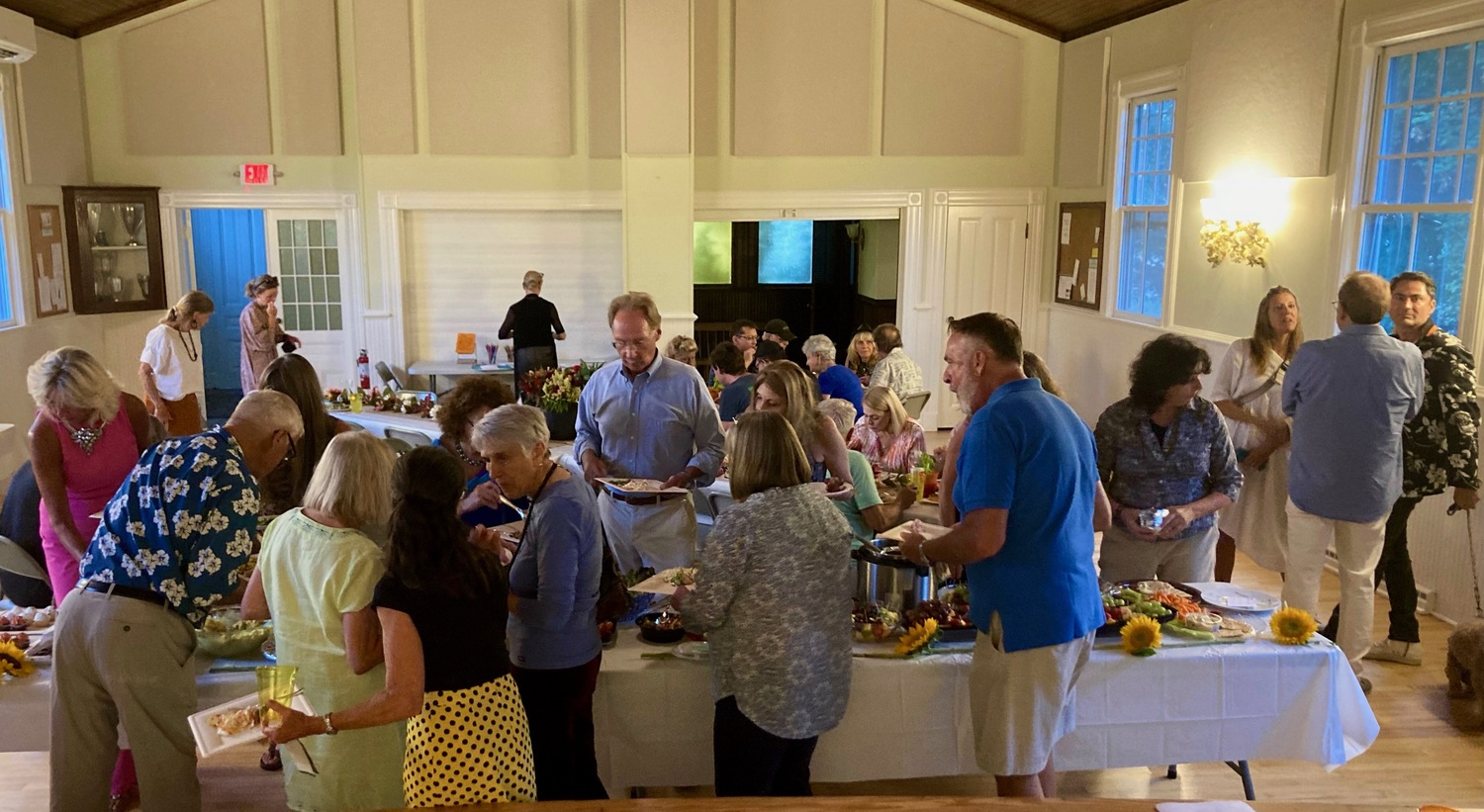 The New Thought Spiritual Center of Eastern Long Island celebrated on Saturday night. with its more than 60 congregation members enjoying a potluck dinner, music and dancing on the stage at the Water Mill Community House. COURTESY NEW THOUGHT SPIRITUALITY CENTER
