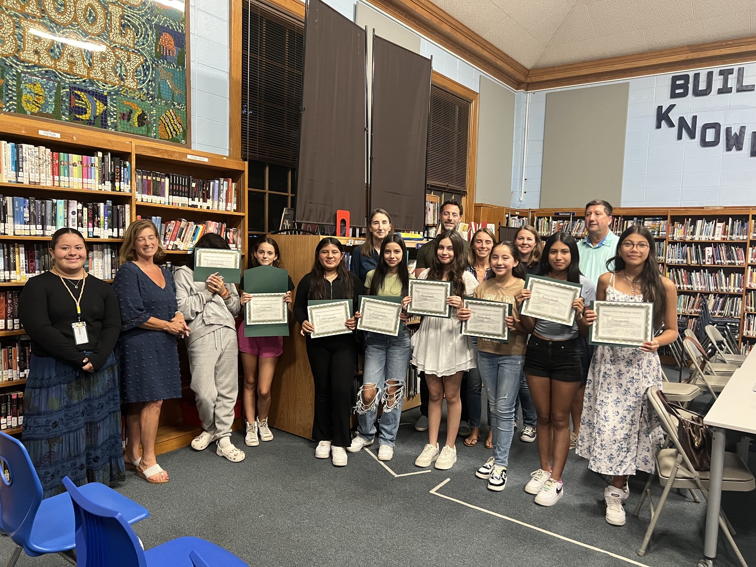 Theresa Roden and the i-tri girls organization, which builds self-esteem among adolescent girls, were recognized at a recent meeting of the Springs Board of Education. COURTESY SPRINGS SCHOOL