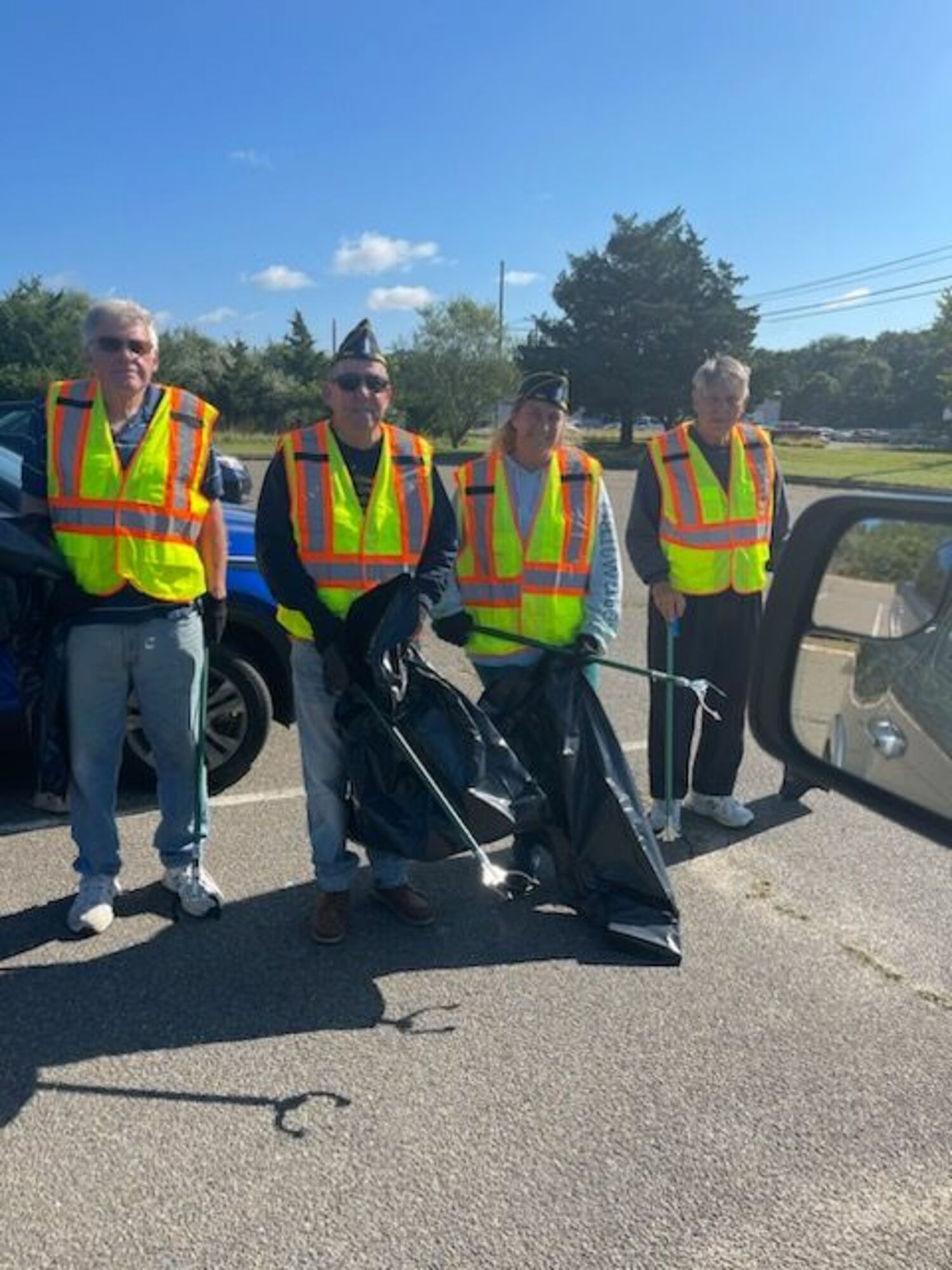 Members of the Westhampton American Legion Post #834 were out recently cleaning up their designated Adopt-A-Highway location. From left, George Motz. Tom Quinn. Lisha Catt and  Tom Hadlock. COURTESY PAUL HAINES