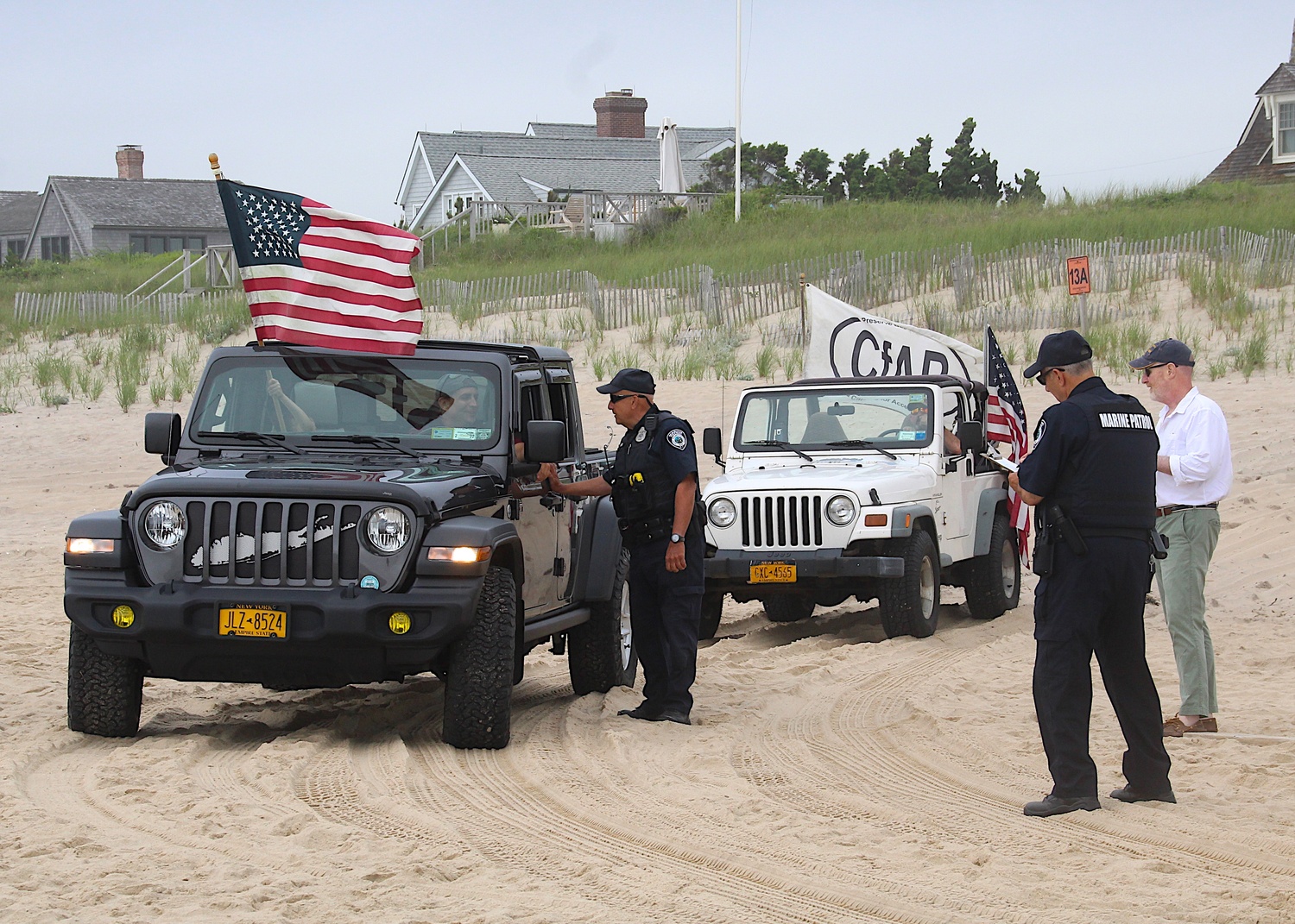 Fisherman and 4x4 owners staged a protest in 2021, overseen by Rodgers, right, that he described as 