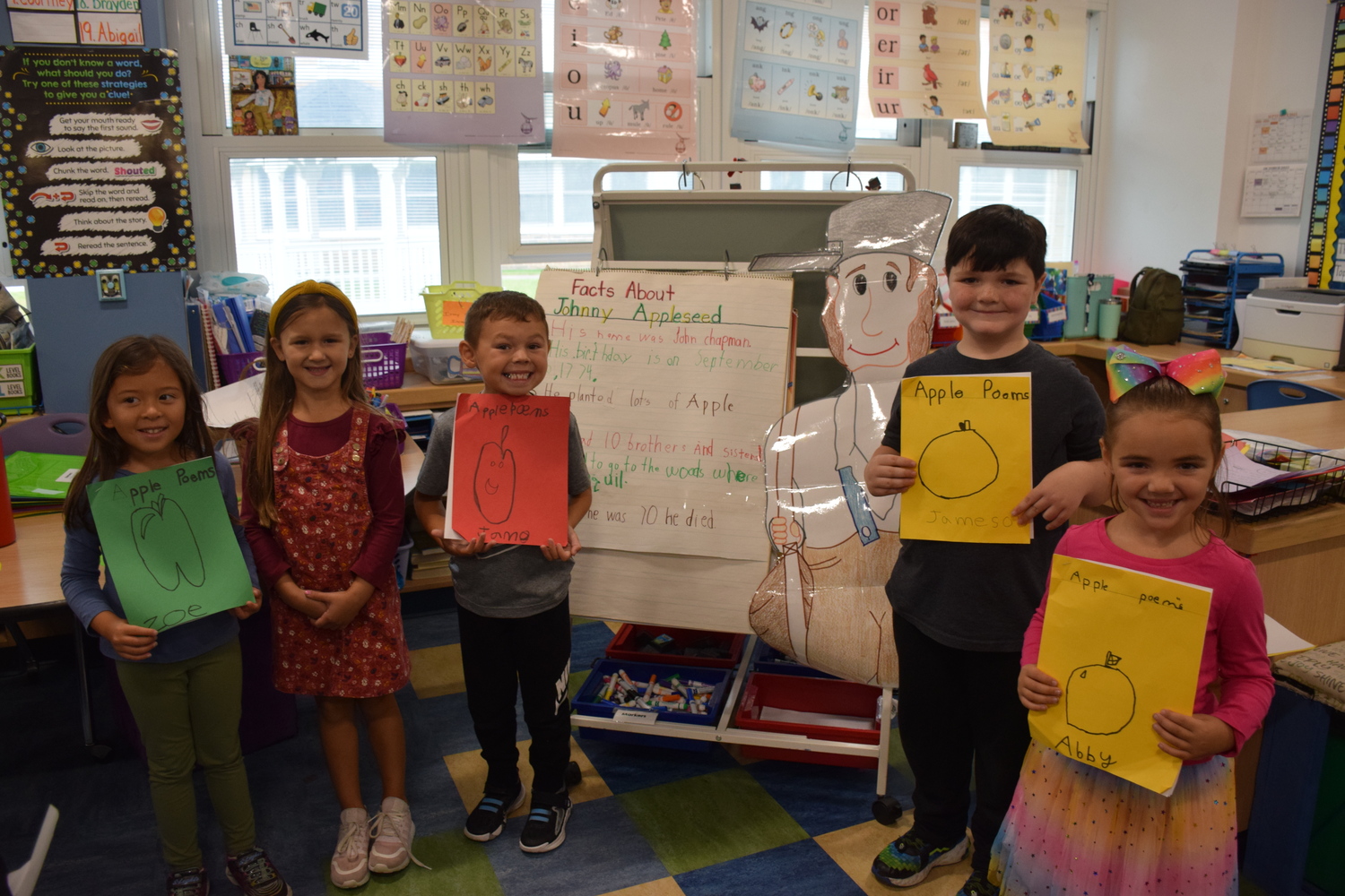 First graders in Michelle Grausso’s class at Tuttle Avenue Elementary School learned about Johnny Appleseed and wrote and studied apple poems. The poetry unit integrated all aspects of the school’s curriculum, with facts from literature learned about John Chapman (Johnny Appleseed), patriotic tunes, information about the apple’s nutritional value, learning about the apple’s life cycles and seasonal changes, songs learned about apples and counting activities. The unit culminated with the students’ reading poetry and singing about apples. COURTESY EASTPORT-SOUTH MANOR SCHOOL DISTRICT