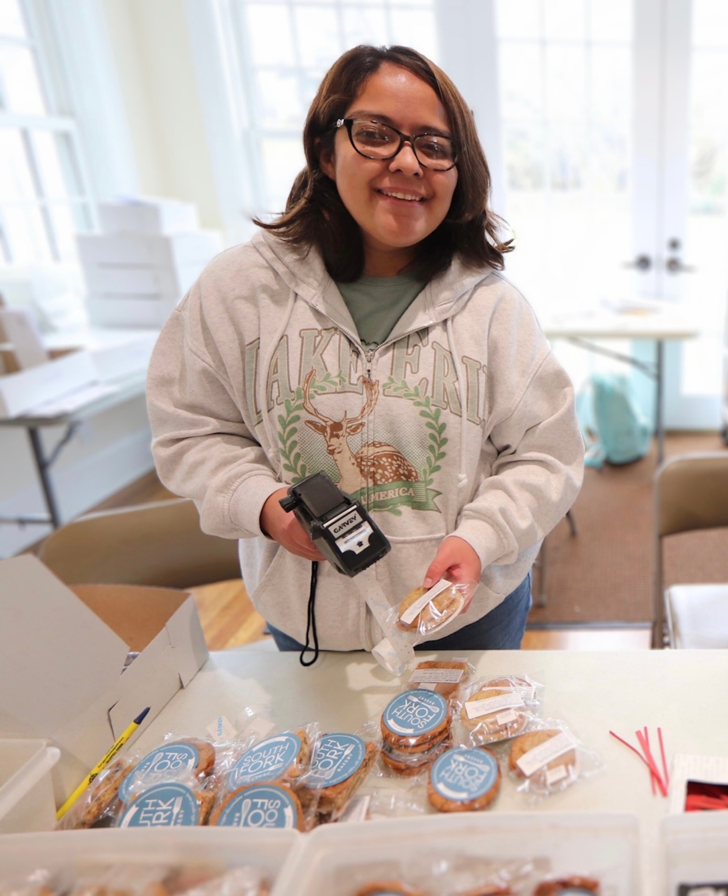 Andrea Soto labels South Fork Bakery cookies. SOUTH FORK BAKERY