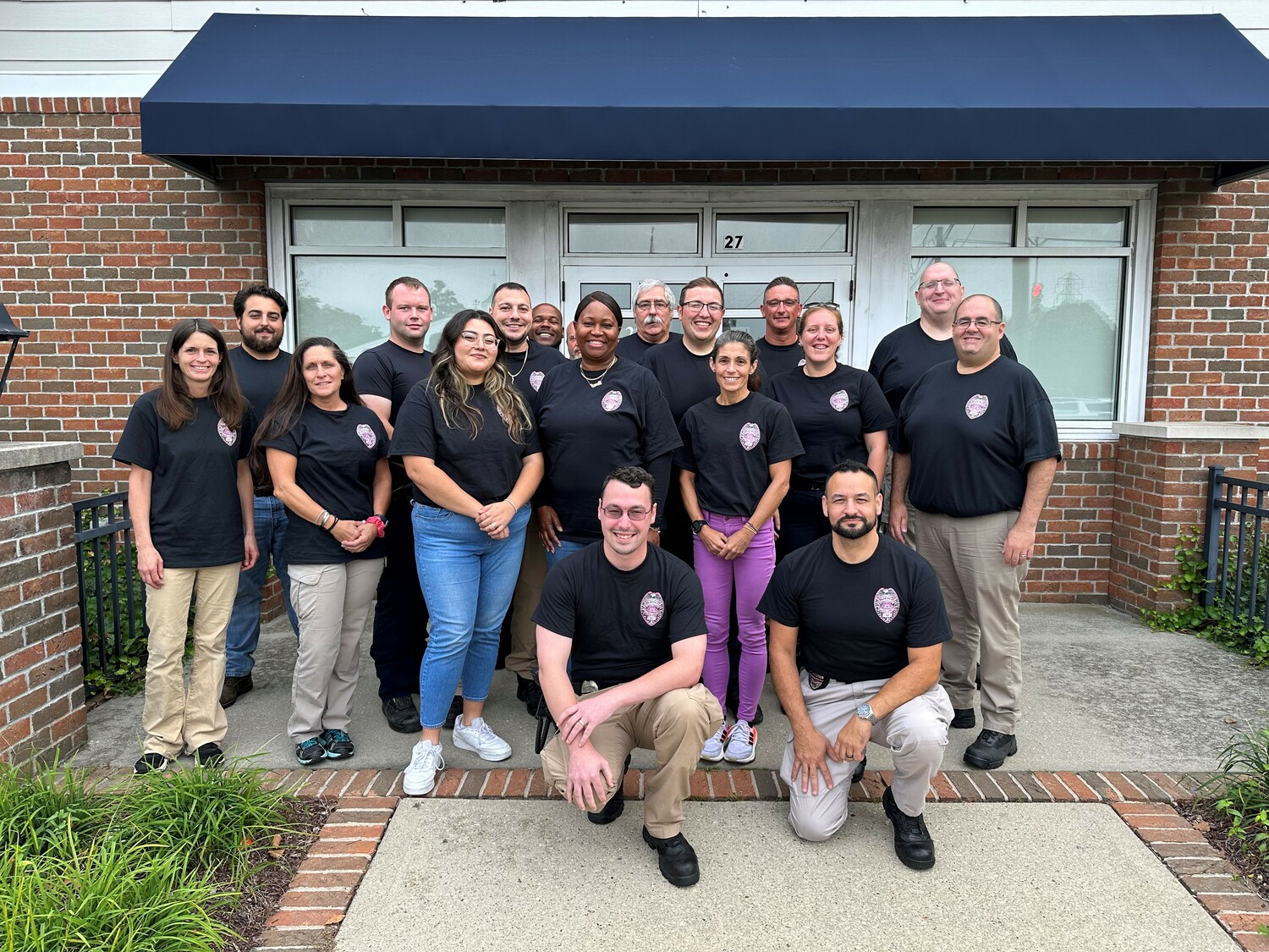 Employees of the Southampton Town Department of Public Safety and Emergency Management will be wearing special uniform shirts on Fridays in October to recognize Breast Cancer Awareness Month. The department consists of the Fire Marshal’s Office, Code Enforcement, Animal Control, the Town Litter Crew and Emergency Management. Uniformed staff from each of these divisions, along with all of the administrative and office support staff will be wearing the pink-themed shirts on Fridays to bring attention to Breast Cancer Awareness Month. “As members of the Town of Southampton community, we are proud to play even a small part in trying to bring attention and enhanced public awareness to Breast Cancer Awareness month and the ongoing
needs for high quality care, education and early detection,” said Town Code Compliance and
Emergency Management Administrator Ryan Murphy.