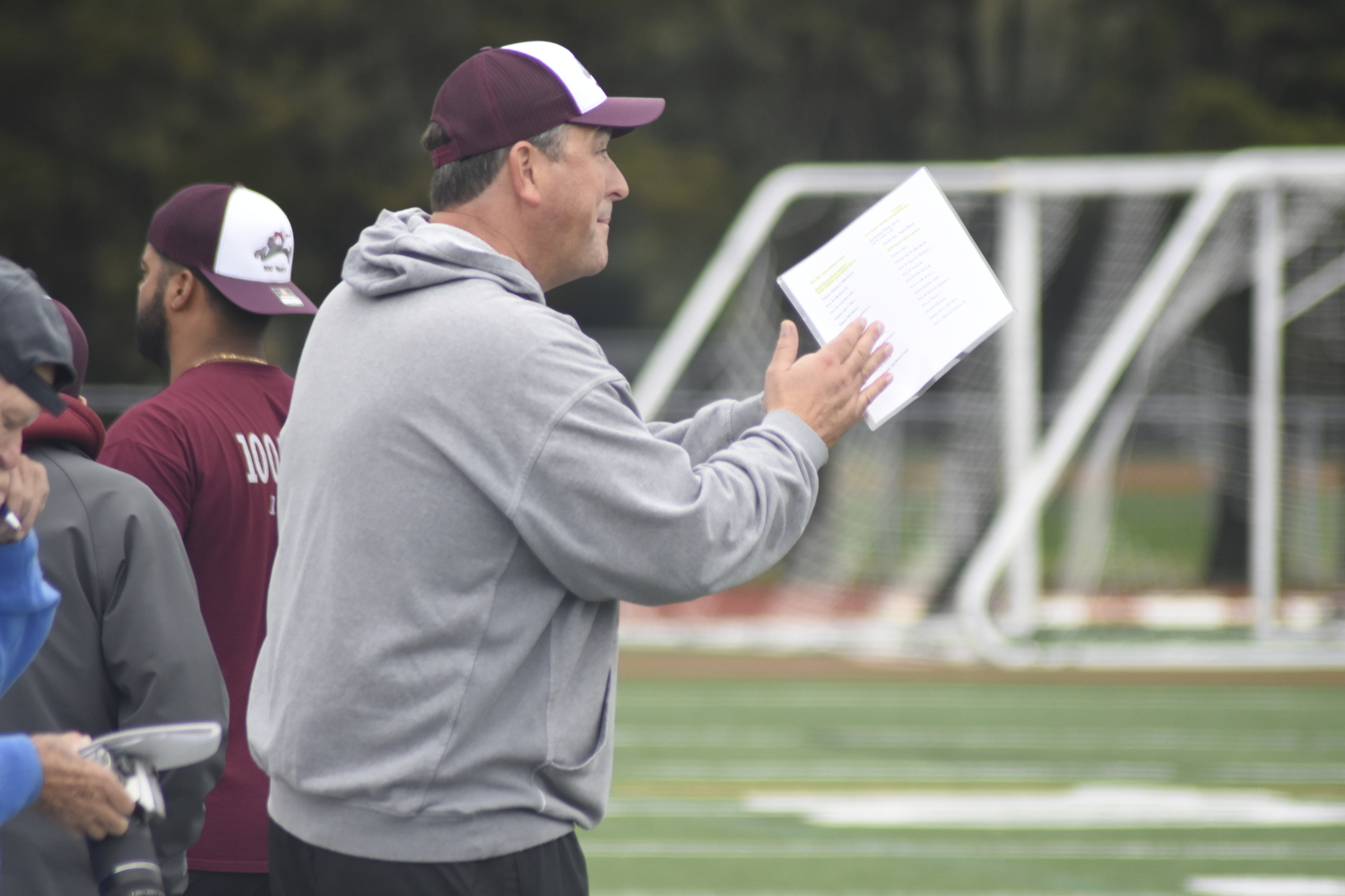 Jason Menu cheers on his team. Menu and fellow assistant Jaron Greenidge led the coaching staff on Saturday after head coach Joe McKee was hospitalized after being hit by a car.   DREW BUDD
