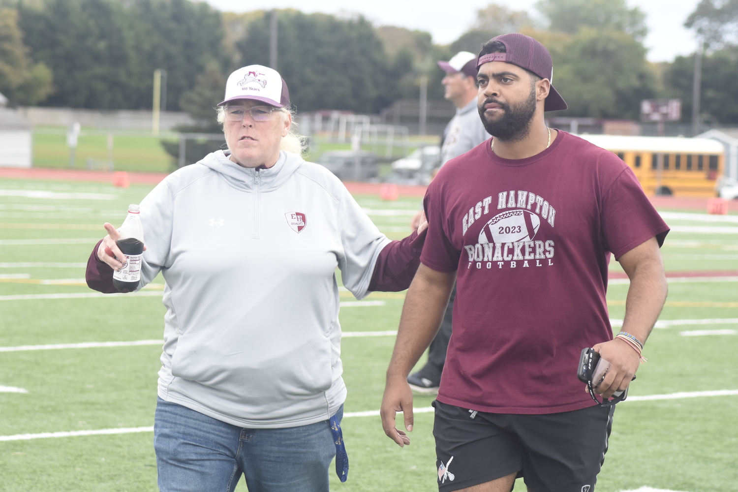 East Hampton Athletic Director Kathy Masterson with assistant coach Jaron Greenidge who, along with assistant Jason Menu, coached the Bonackers on Saturday after head coach Joe McKee was hospitalized after being hit by a car earlier Saturday morning.   DREW BUDD