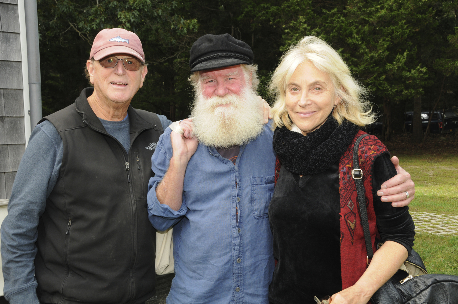 Robert Loesch, Scott Chaskey and Laurie Dolphin at Duck Creek Arts Center in Springs on Sunday. The Peter Matthiessen Center, Joanne Friedland Roberts and Daniela Kronemeyer presented 