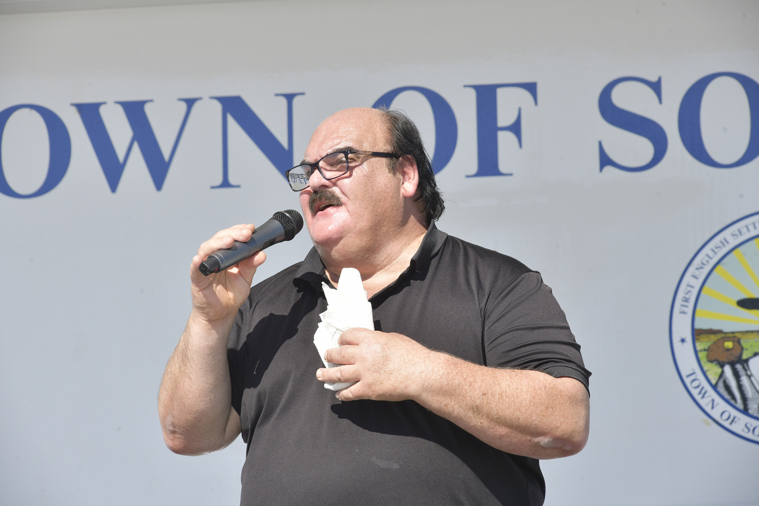 Carmelo Raccuglia performs at the San Gennaro Feast of the Hampton on Saturday.