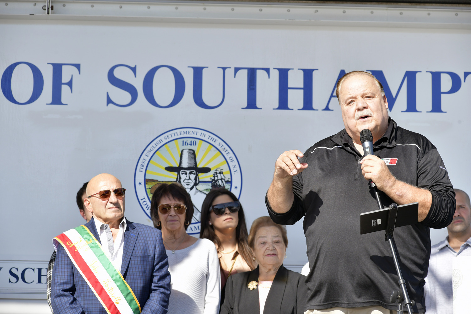 Rick Martel introduces San Gennaro Feast of Hamptons Grand Marshal John Tortorella.