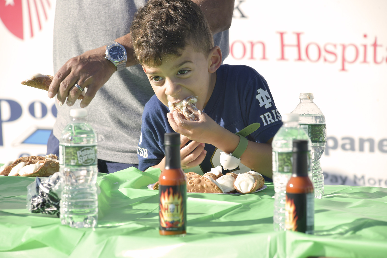 Jake DiFiglia, 6, of East Moriches during the cannoli eating contest on Saturday.