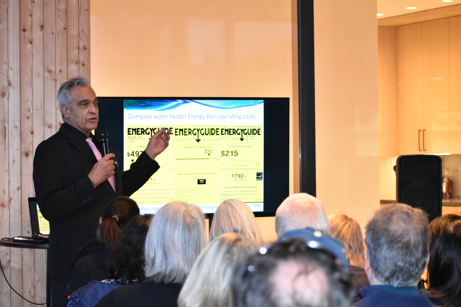 Jean-Pierre (J-P) Clejan speaks to AIA Peconic members about heat pumps and alternatives to flame-based heating options during a presentation at a new nearly net-zero Wainscott home.  BRENDAN J. O'REILLY