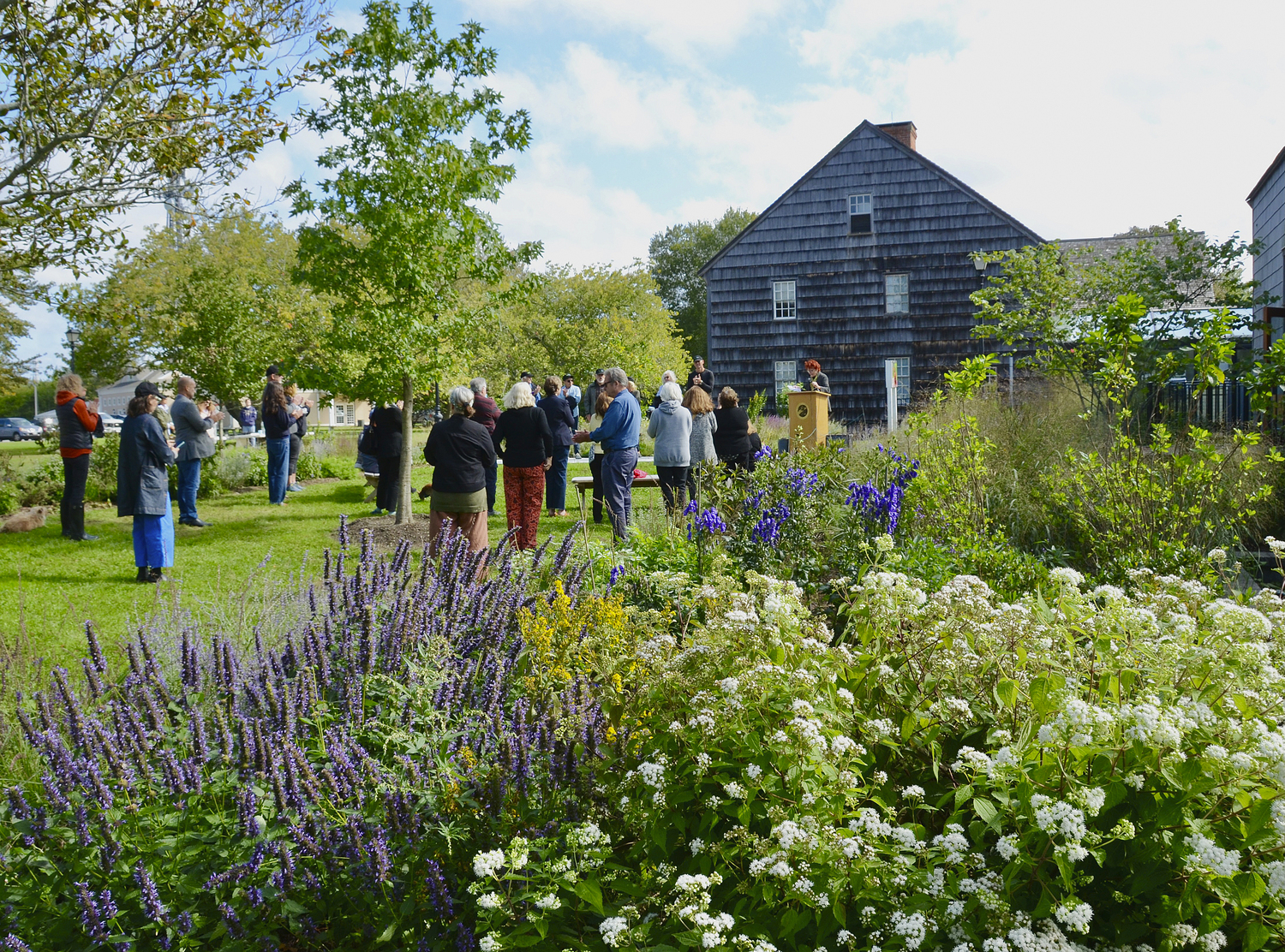 On September 27, The town of East Hampton and  ChangeHampton  honored funders, businesses, town departments, and volunteers, including East Hampton Middle and High School students, who contributed to bringing the East Hampton Town Hall pollinator garden to fruition.   KYRIL BROMLEY
