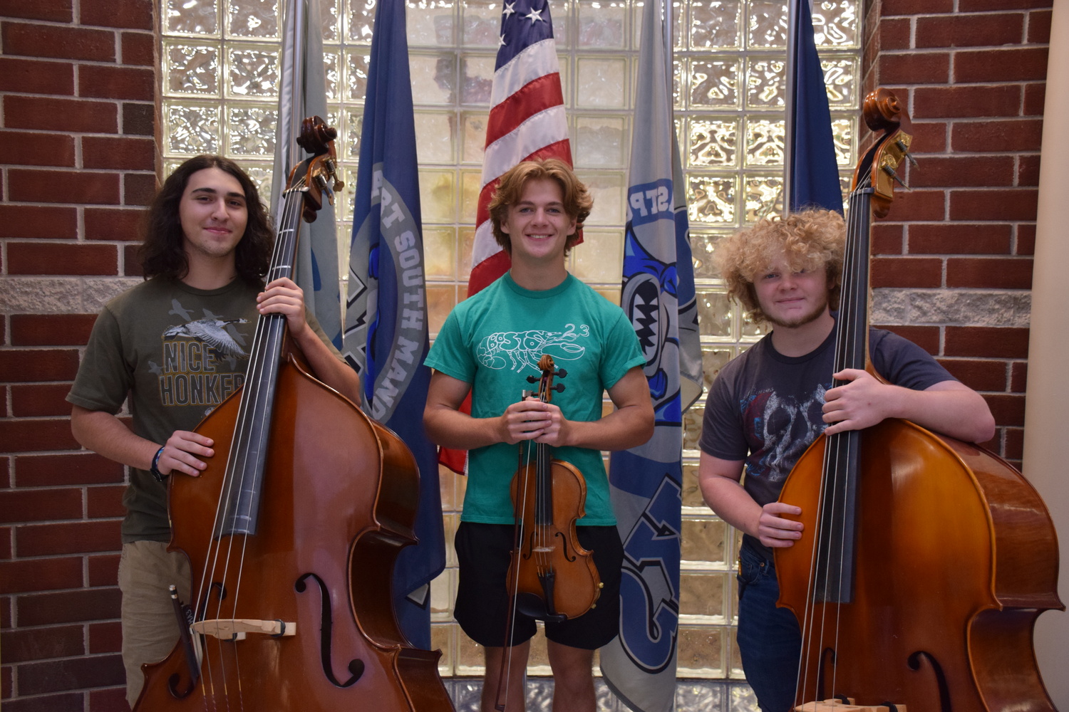 Eastport-South Manor Jr.-Sr. High School musicians, from left, John Schroeder, Grant Burns and Alexander Kapopulos were selected to perform at the NYSSMA All-State Winter Conference. COURTESY EASTPORT0SOUTH MANOR SCHOOL DISTRICT