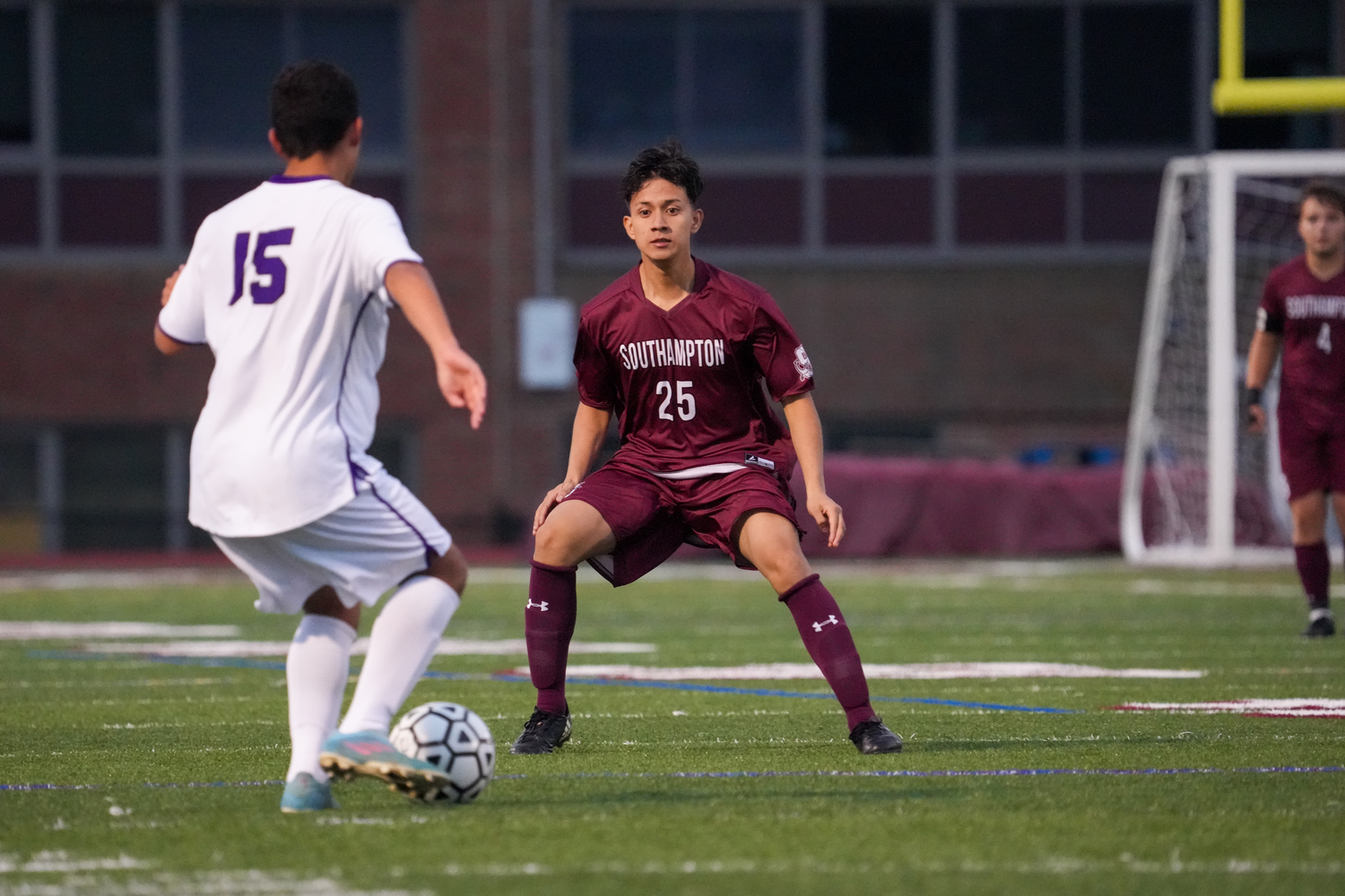 Southampton's Josue Leon defends against Kaleb Flores of Hampton Bays.  RON ESPOSITO