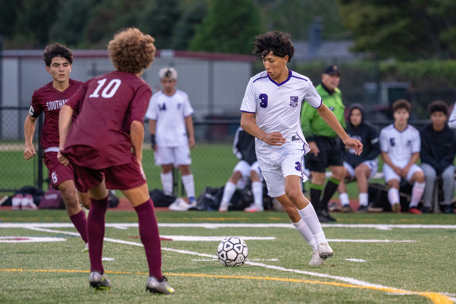 Hampton Bays senior Justin Contreras works the  ball.  RON ESPOSITO