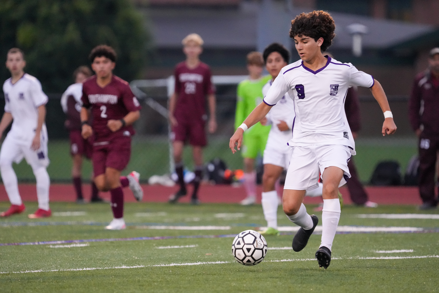 Hampton Bays senior Marco Ibarra controls the ball at midfield.  RON ESPOSITO