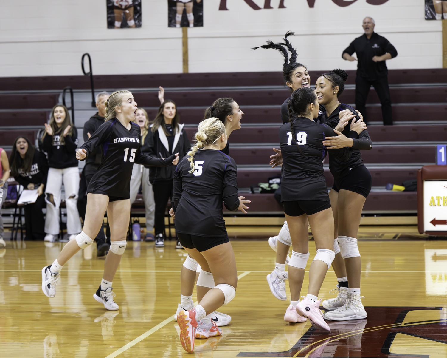 Hampton Bays' girls volleyball team celebrates its 3-2 win over Kings Park in the opening round of the Class A playoffs. MARIANNE BARNETT