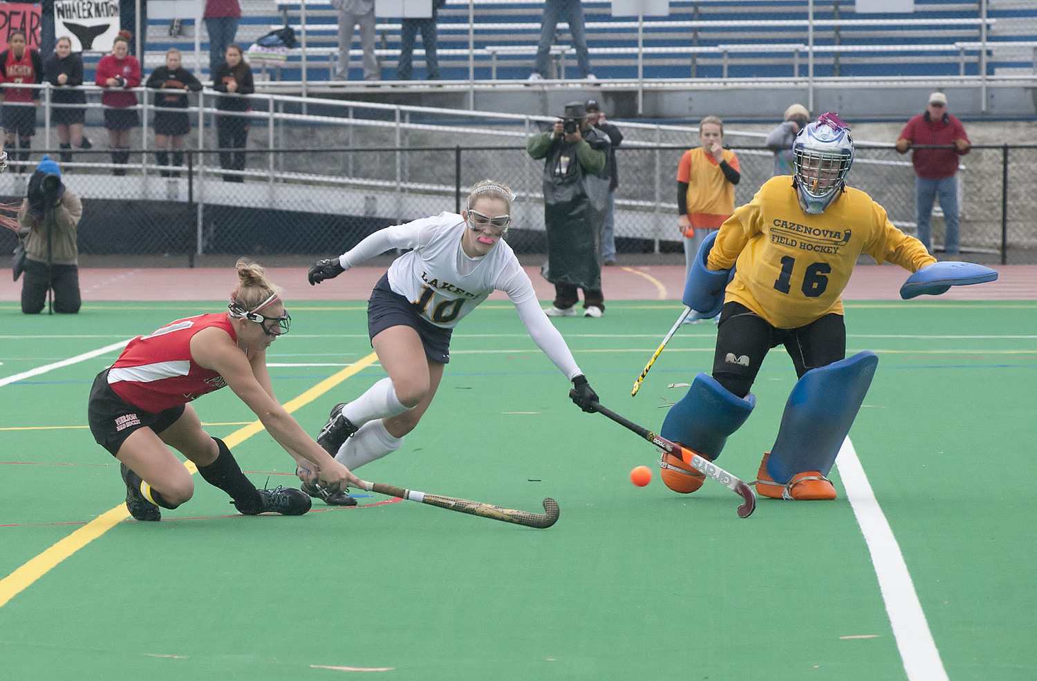 Pierson's Kasey Gilbride takes a shot on goal during the NYSPHSAA Class C Final field hockey playoff between the Pierson/Bridgehampton Lady Whalers and the Cazenovia Lady Lakers at Cicero High School on November 17, 2013.  MICHAEL HELLER