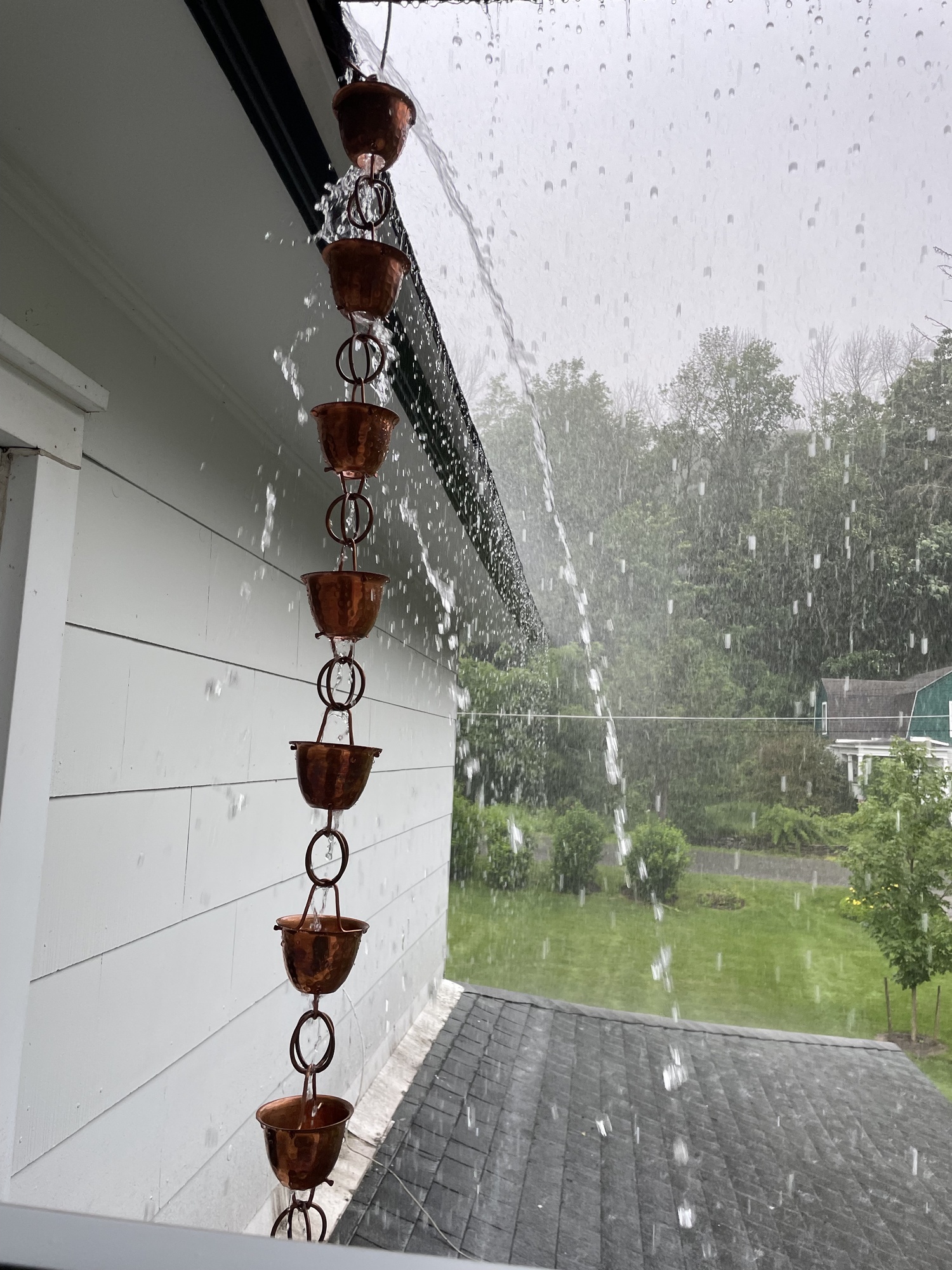 This rain chain works well in a light rain. However, as you can see, in a moderate to heavy rain the water overshoots the chain, making the device pointless. SHELLEY SMITH