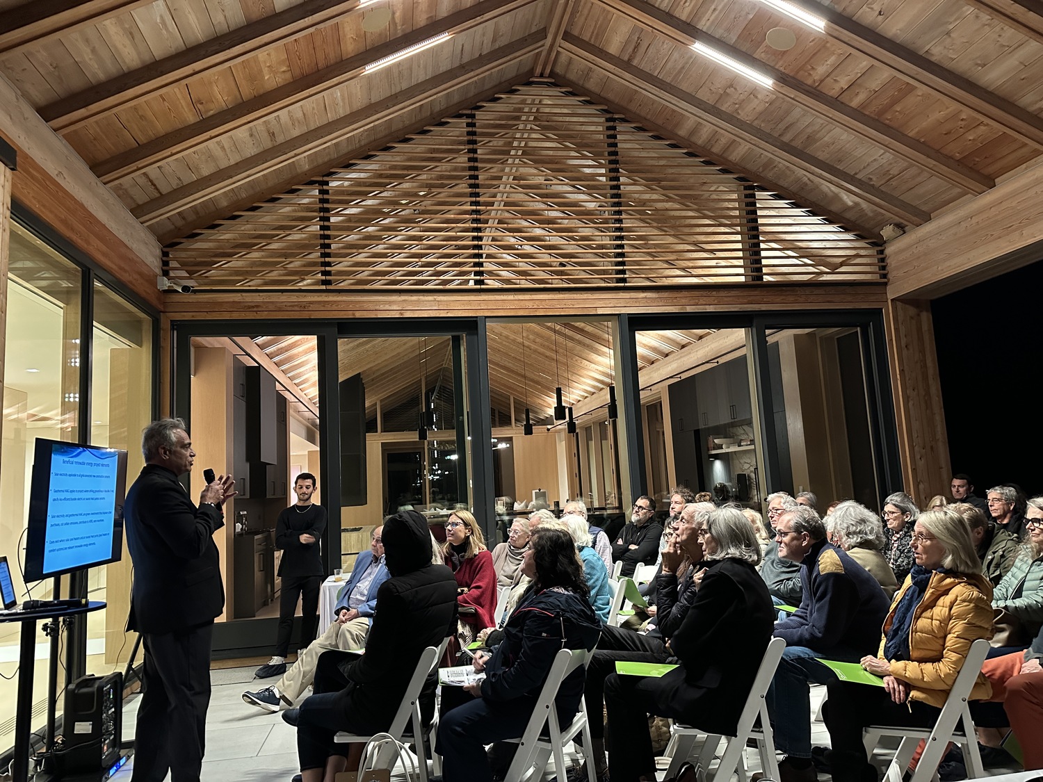 Jean-Pierre (J-P) Clejan speaks to AIA Peconic members about heat pumps and alternatives to flame-based heating options during a presentation at a new nearly net-zero Wainscott home.  BRENDAN J. O'REILLY