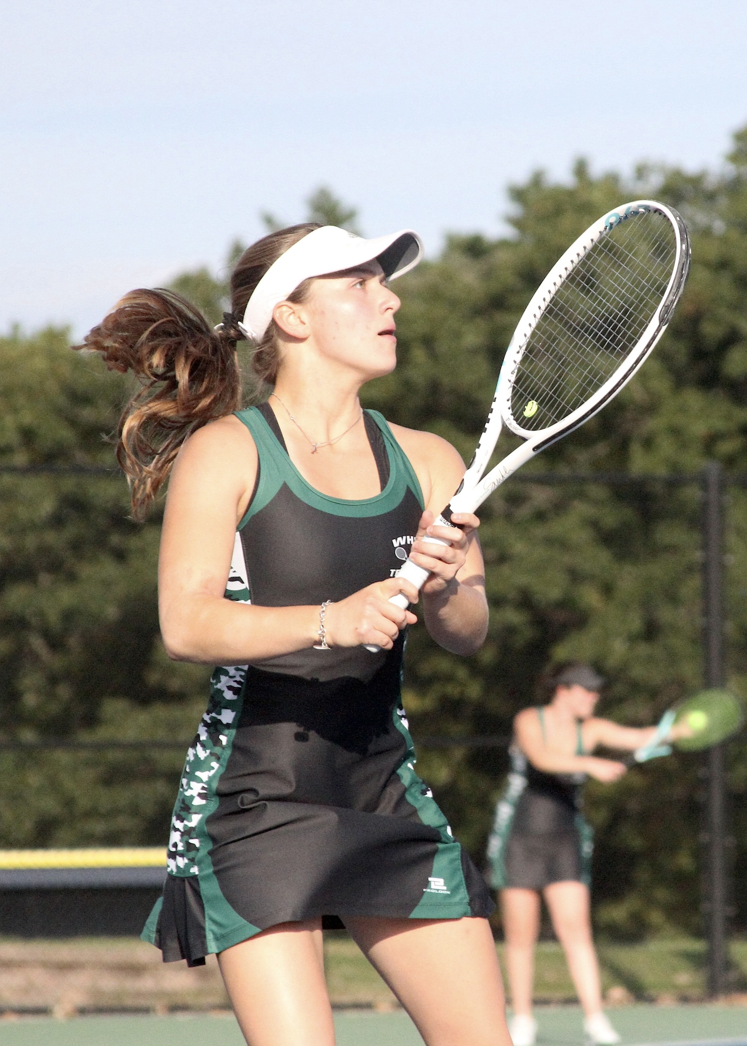 Junior Matilda Buchen keeps her eyes up as she waits for the ball to drop. DESIRÉE KEEGAN