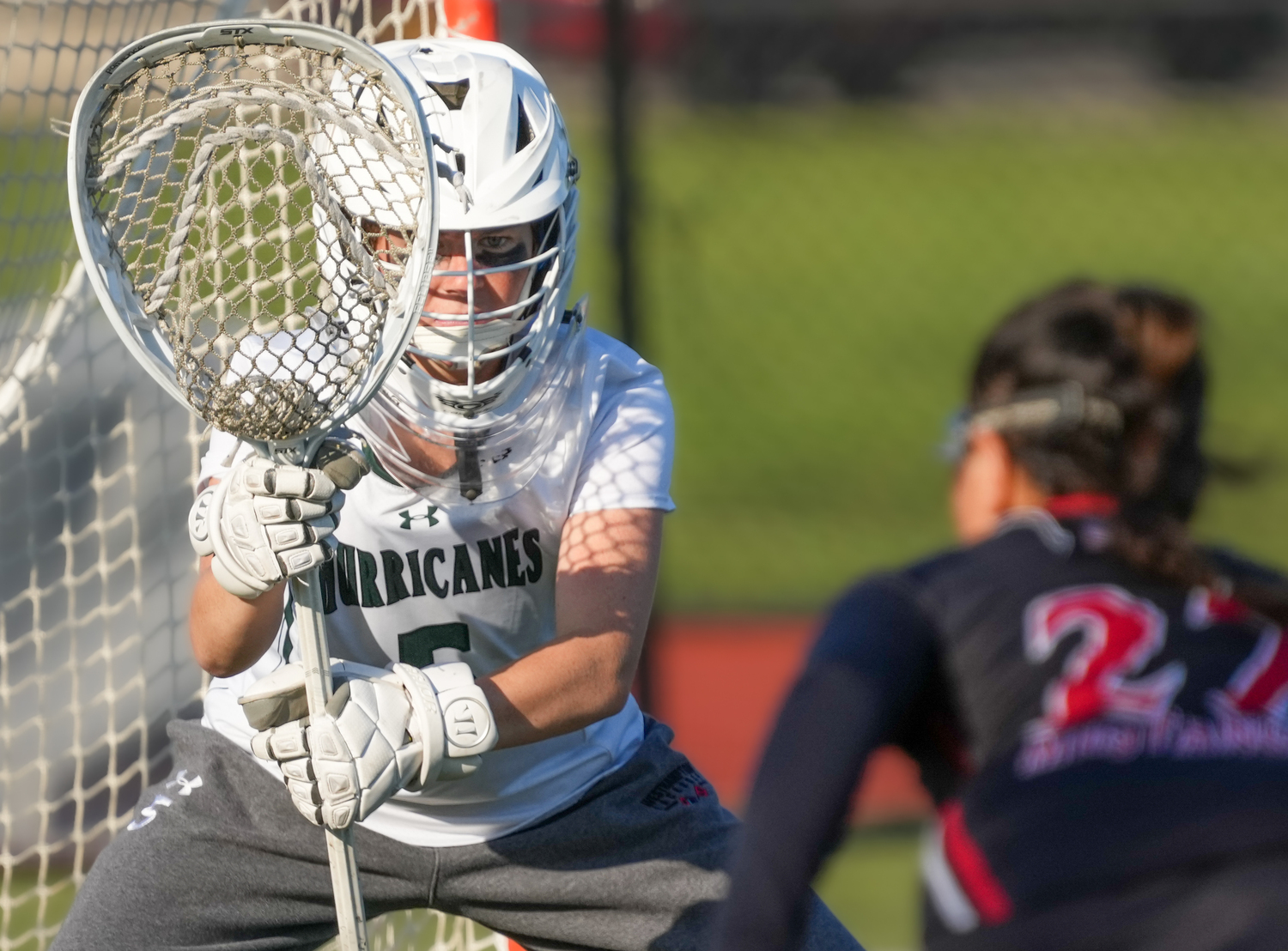 Junior goalkeeper Maya Farnan squares up against a Mt. Sinai opponent during a Class C playoff match last year. RON ESPOSITO