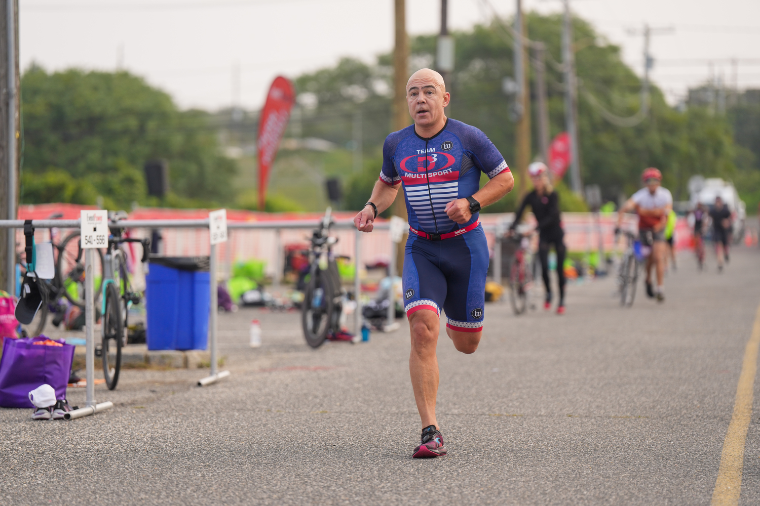 A triathlete starting the running portion.   RON ESPOSITO