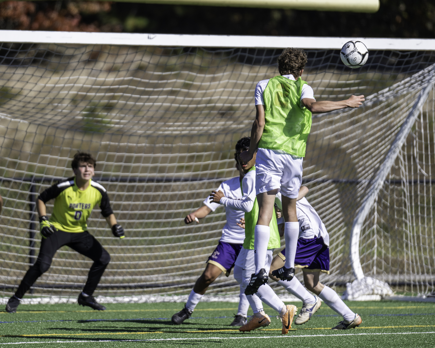 Pierson junior Andy Wayne directs the ball with a header to the opposite side of the net for a goal.   MARIANNE BARNETT