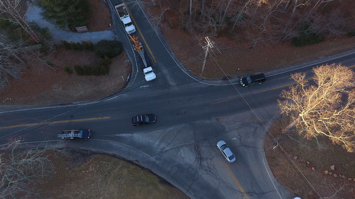 The current configuration of the intersection can be a dangerous confluence of vechicles trying to turn into or across lanes of fast-moving traffic on a busy secondary artery. 
MICHAEL WRIGHT